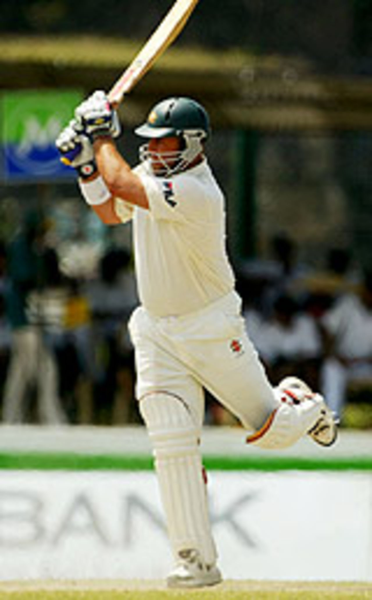 Darren Lehmann balances on one leg and smacks the ball, Sri Lanka v Australia, 1st Test, Galle, March 11, 2004