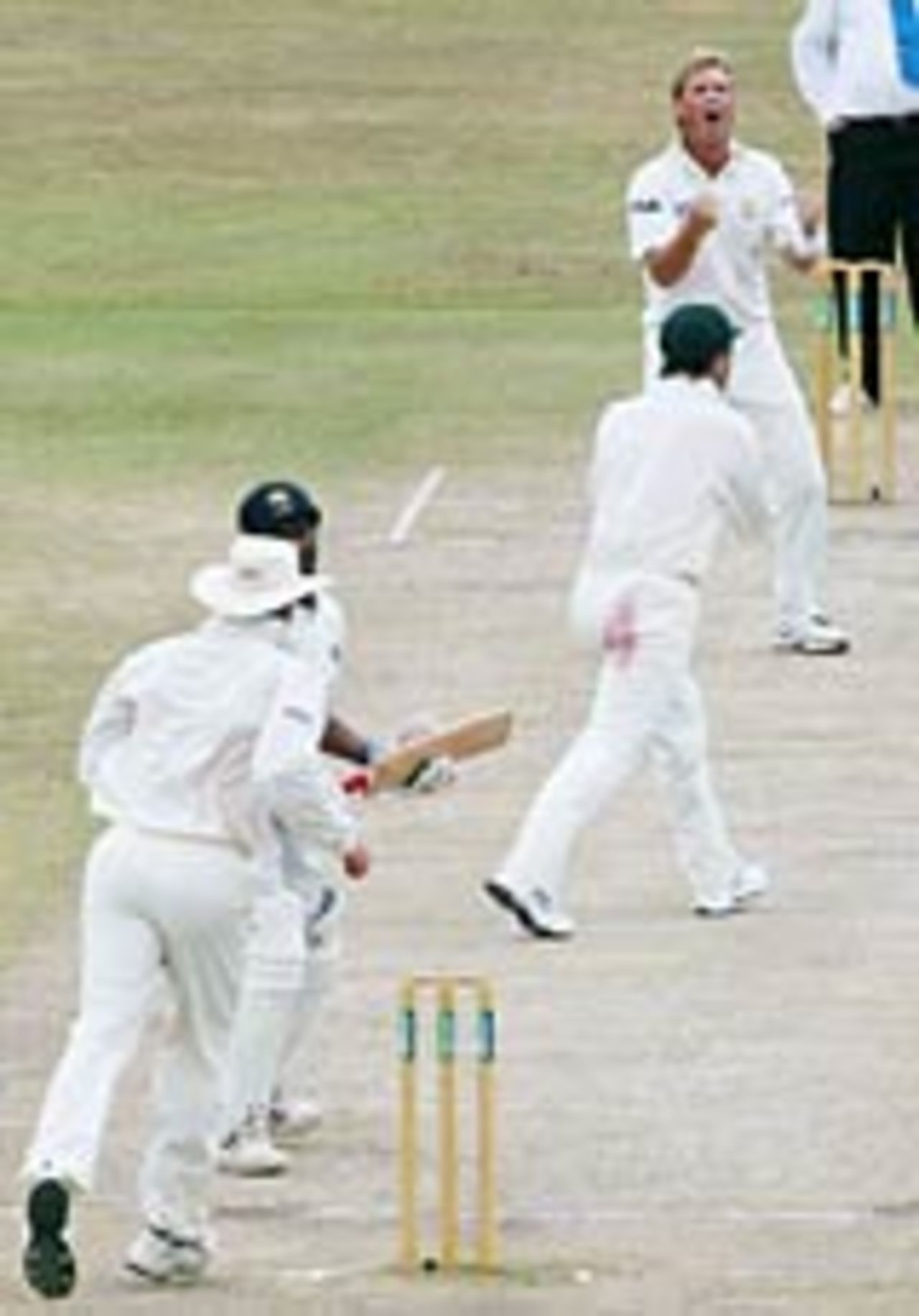 Shane Warne celebrates his 500th Test wicket, Sri Lanka v Australia, 1st Test, Galle, 5th day, March 12, 2004