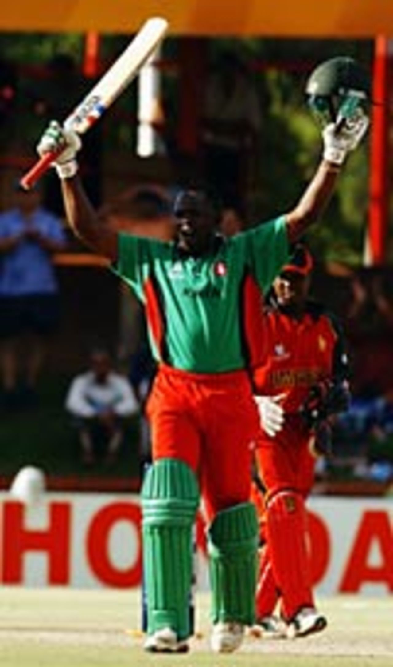 Maurice Odumbe celebrates hitting the winning runs, Kenya v Zimbabwe, World Cup 2003