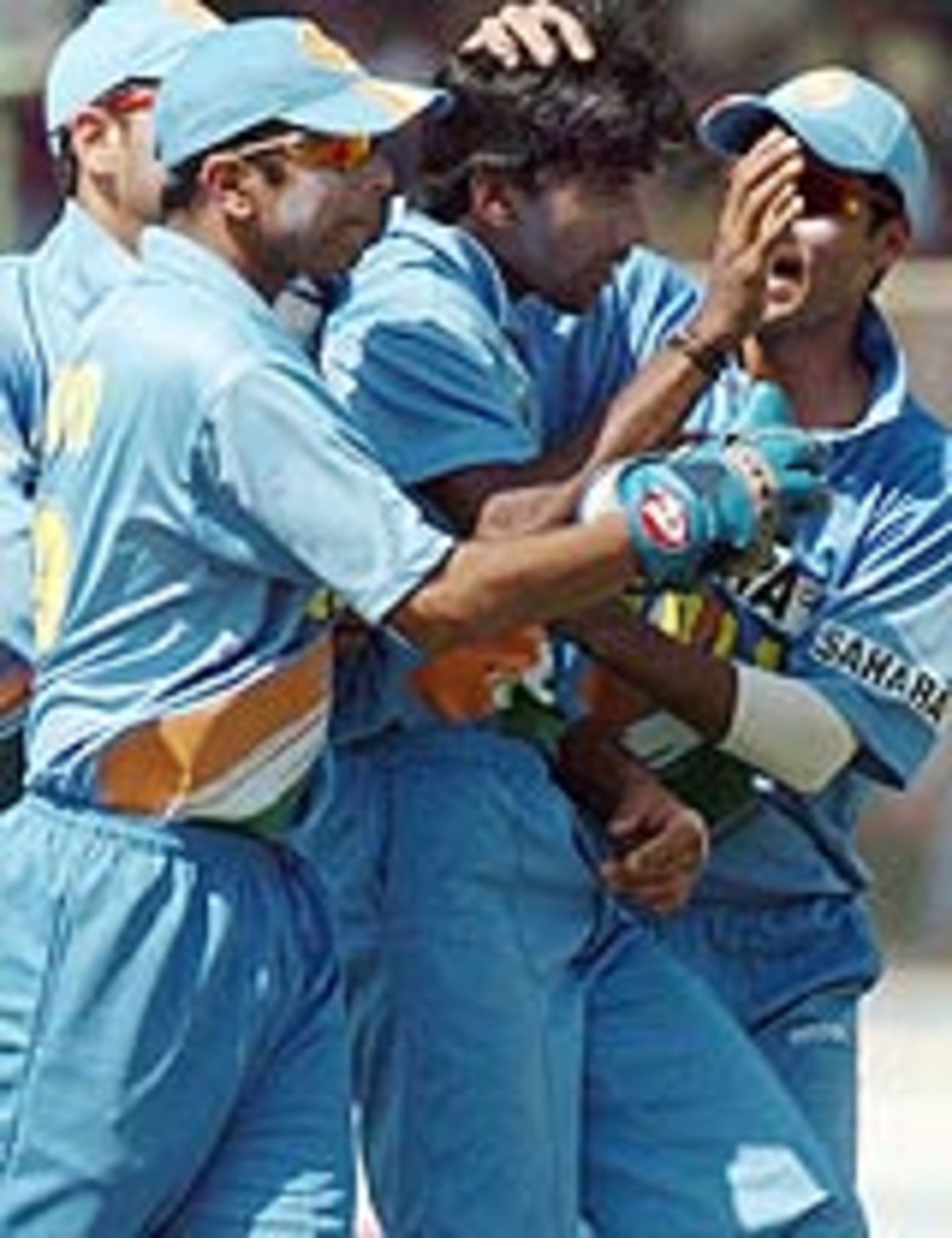 Laxmipathy Balaji is congratulated by his team-mates for the wicket of Yasir Hameed, Pakistan v India, 1st ODI, Karachi, March 13, 2004