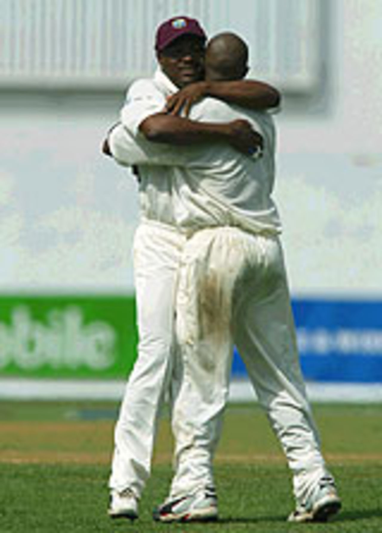 Tino Best is congratulated by Brian Lara, West Indies v England, 1st Test, Kingston, 3rd day, March 13, 2004