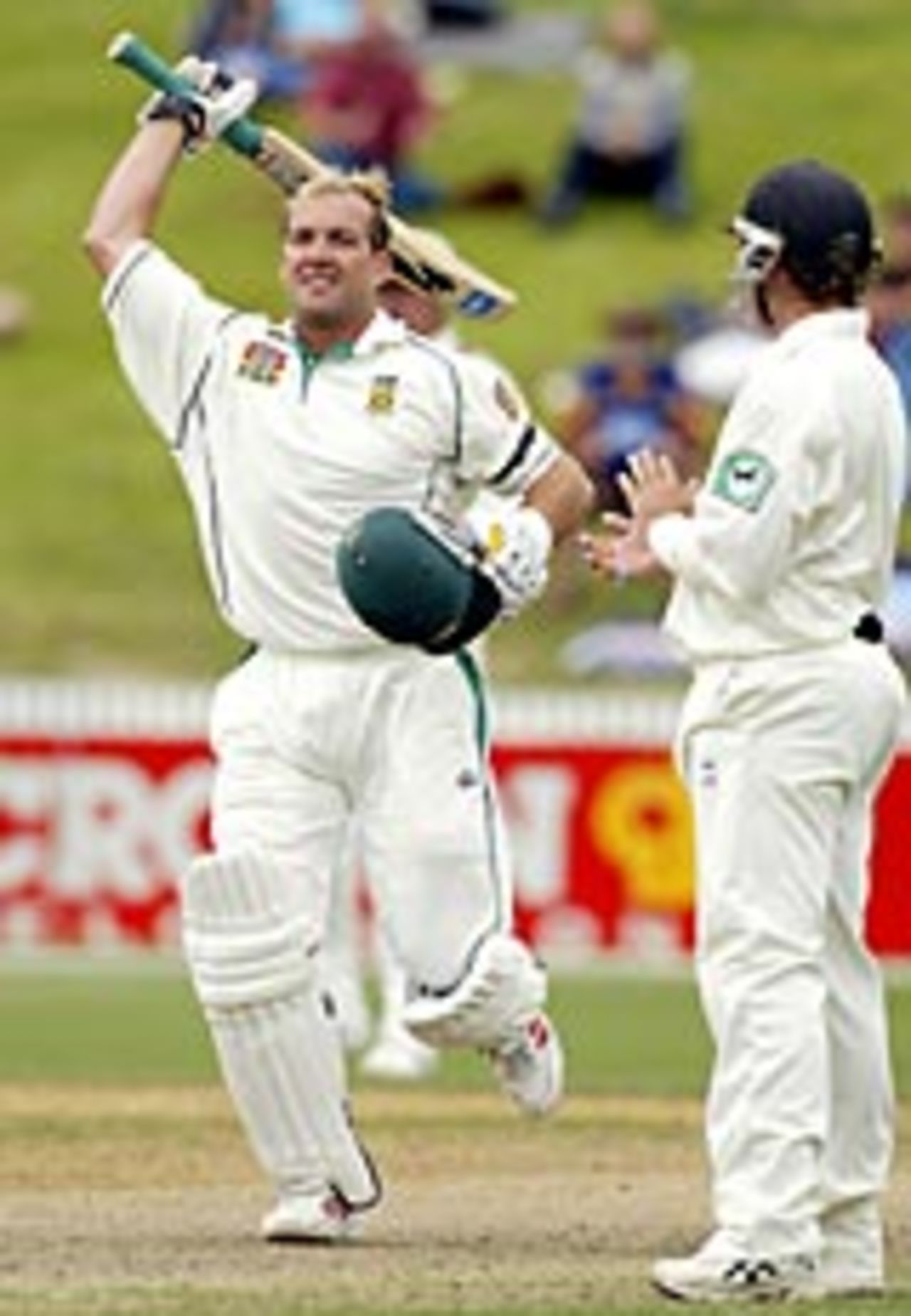 Jacques Kallis celebrates his hundred, New Zealand v South Africa, 1st Test, Hamilton, 5th day, March 14, 2004