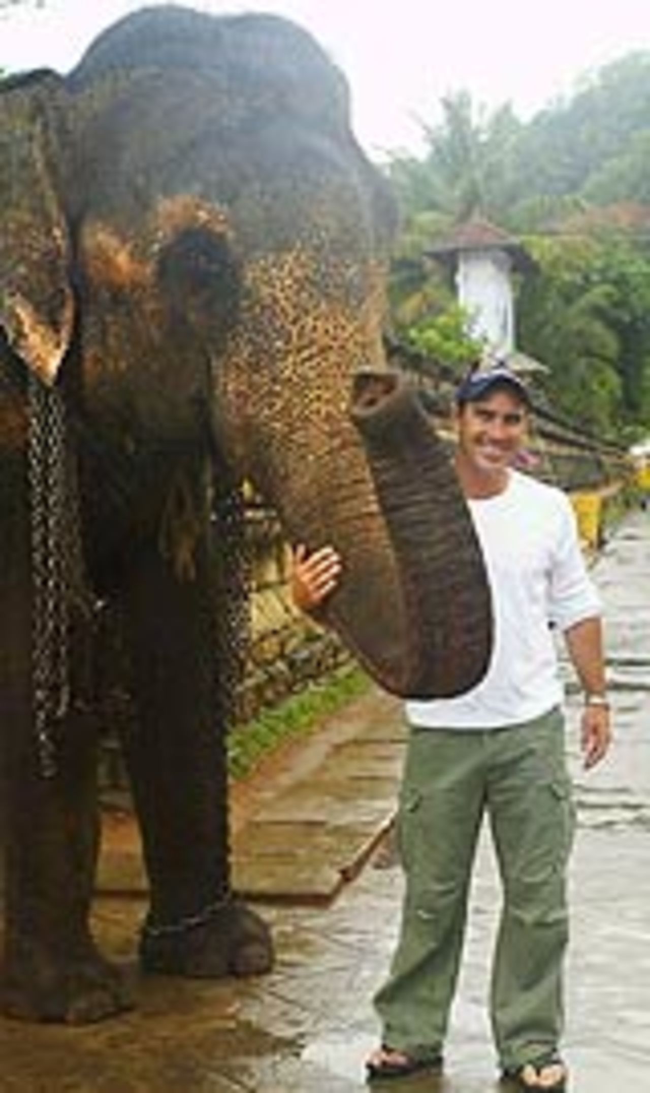 Justin Langer and an elephant, Temple of the Tooth, Kandy, March 15, 2004