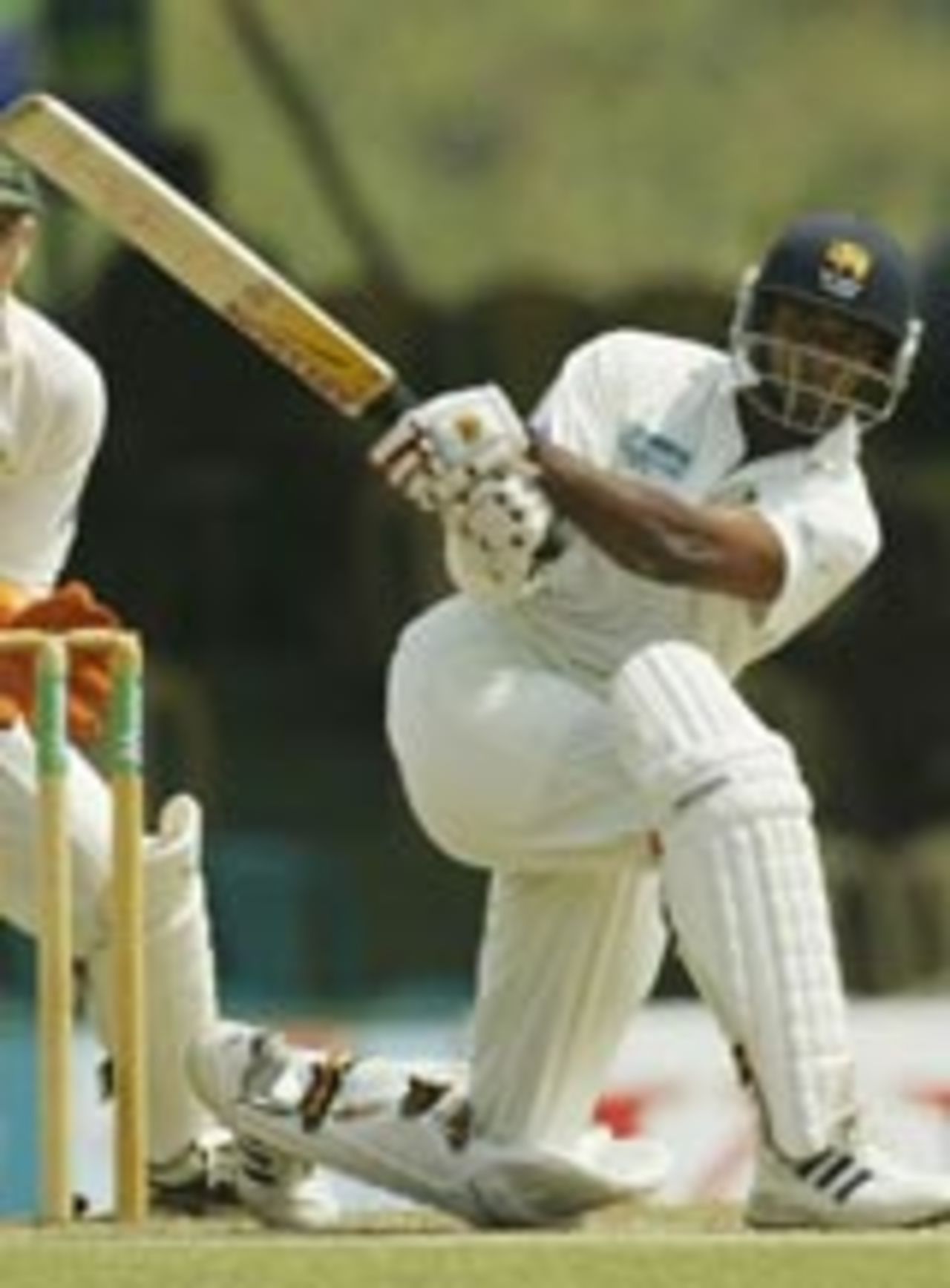Chaminda Vaas plays the slog-sweep, Sri Lanka v Australia, 2nd Test, Kandy, 2nd day, March 17, 2004