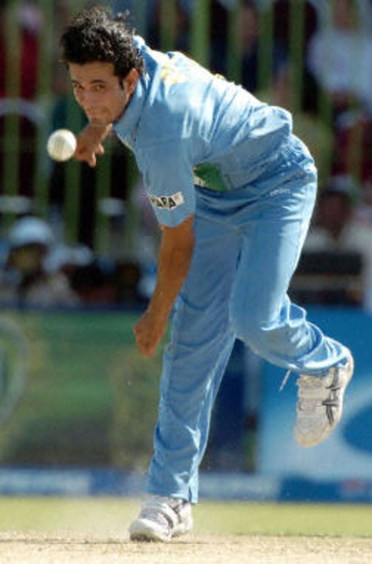 Irfan Pathan delivers a ball to Yasir Hameed of Pakistan