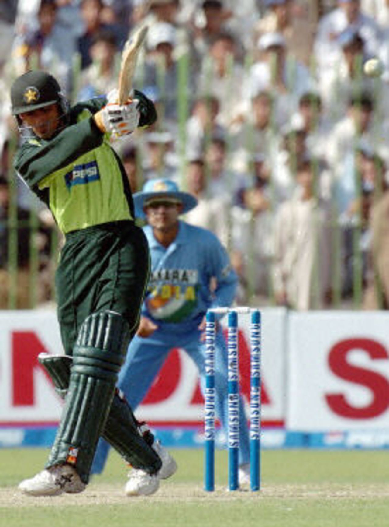 Yasir Hameed plays it to the on side as Sehwag watches from slip