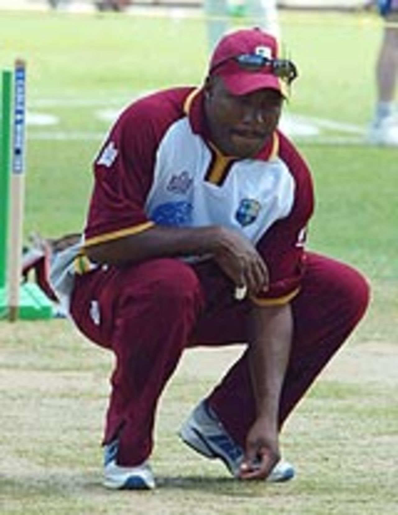 Brian Lara inspects the wicket, Trinidad, March 19, 2004