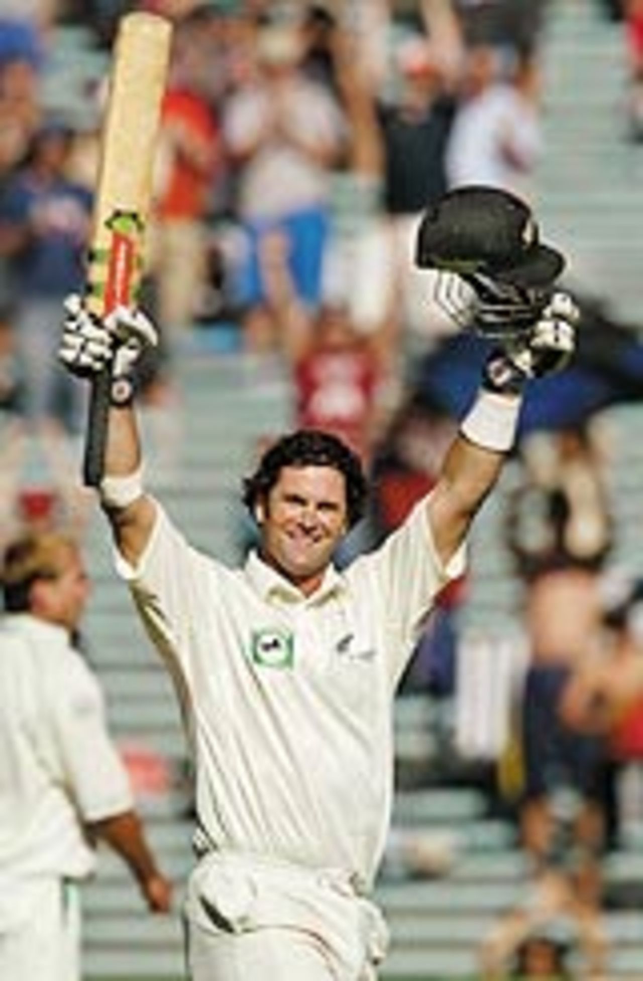 Chris Cairns raises his arms after scoring a century, New Zealand v South Africa, 2nd Test, Auckland, 3rd day, March 20th, 2004