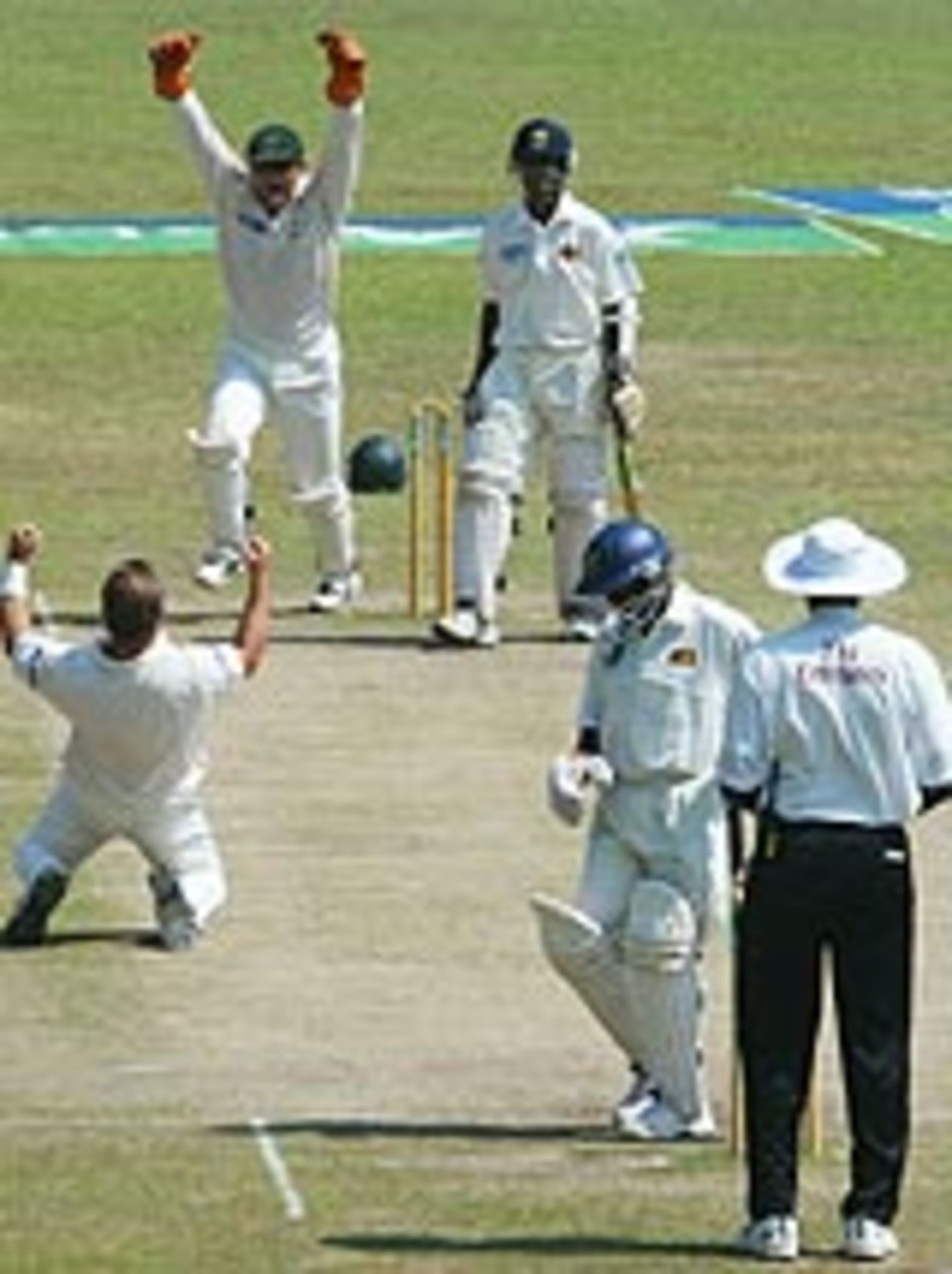 Australia celebrate as the last Sri Lankan wicket falls, Sri Lanka v Australia, 2nd Test, Kandy, 5th day, March 20, 2004