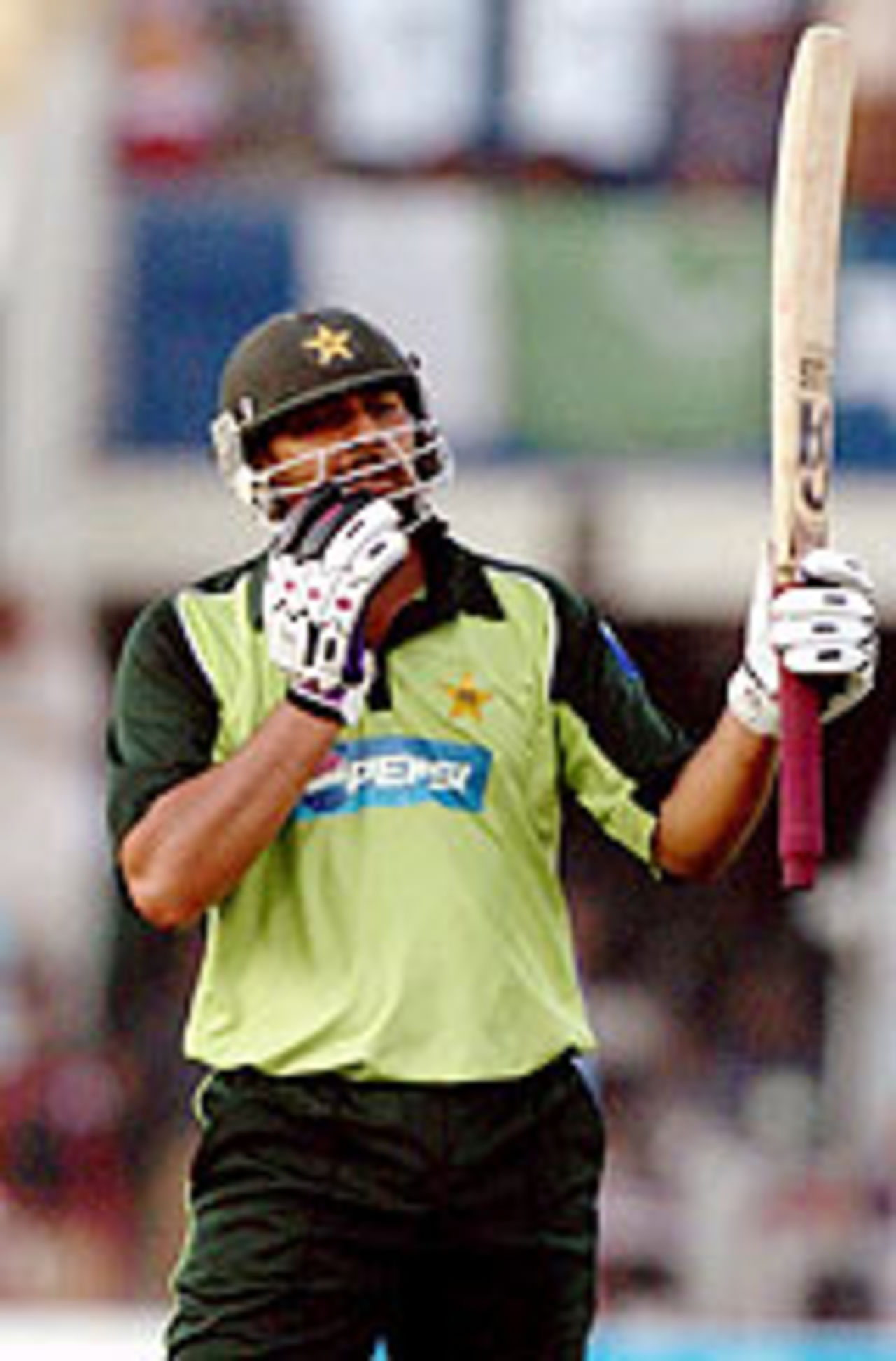 Inzamam-ul-Haq acknowledges the applause for his century, Pakistan v India, 4th ODI, Lahore, March 21, 2004