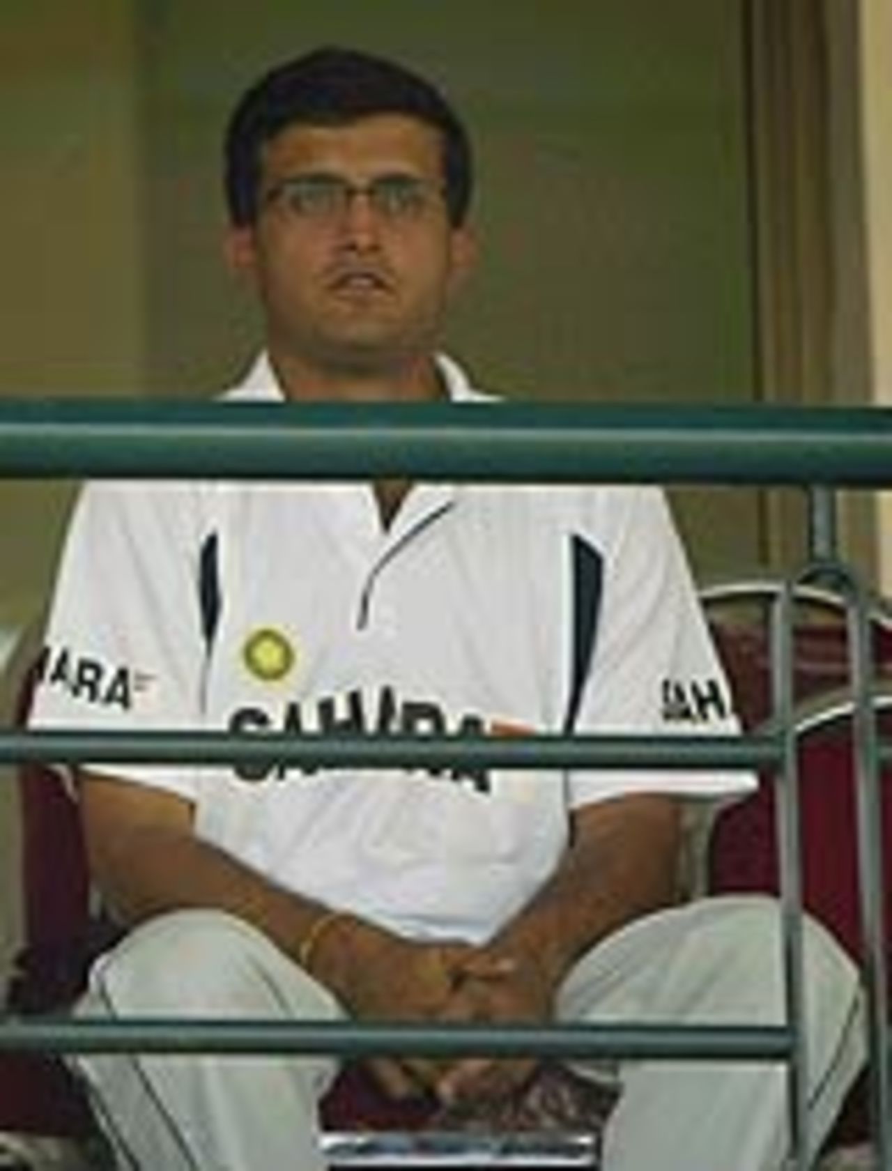 Sourav Ganguly watches from the balcony, as his team works out in the nets before the first Test between India and Pakistan at Multan, March 27, 2004