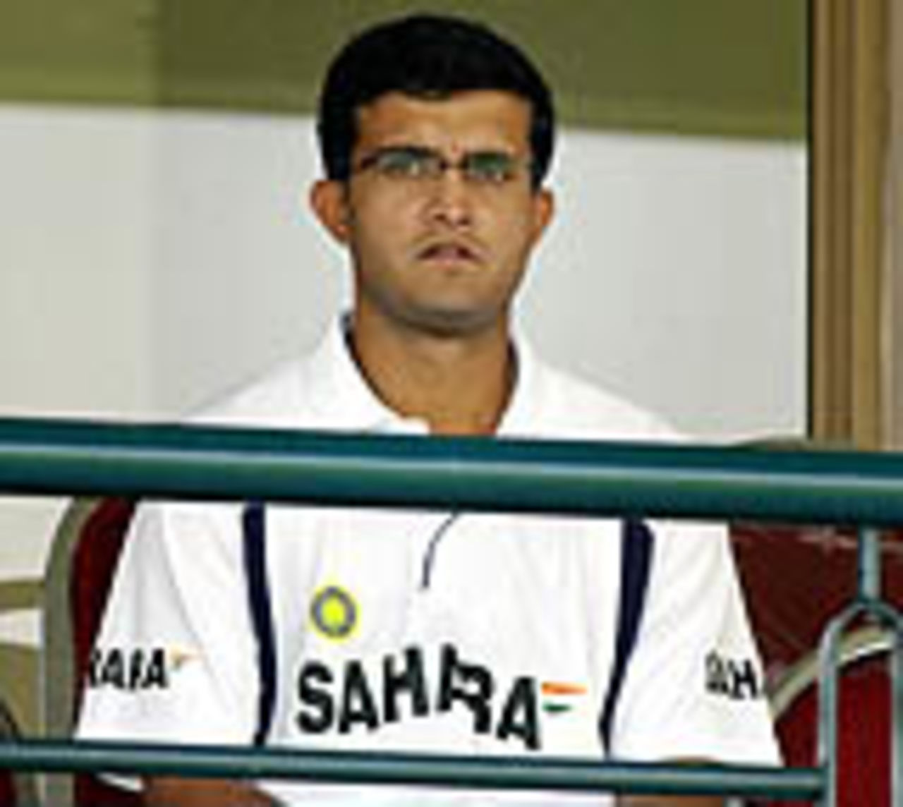 Sourav Ganguly, with an injured back, watches from the pavillion