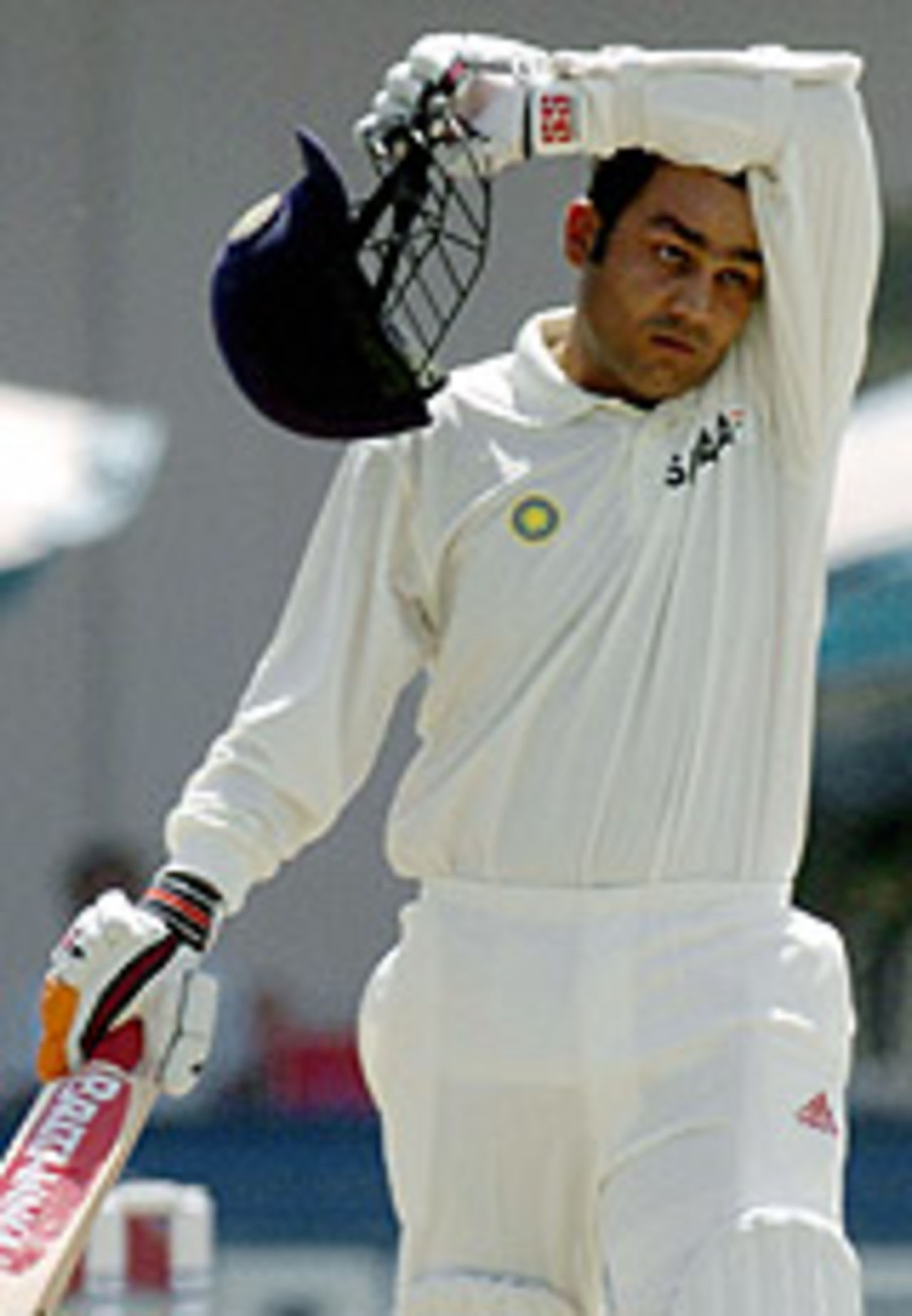 Virender Sehwag wipes away his sweat, Pakistan v India, 1st Test, Multan, 1st day, March 28, 2004