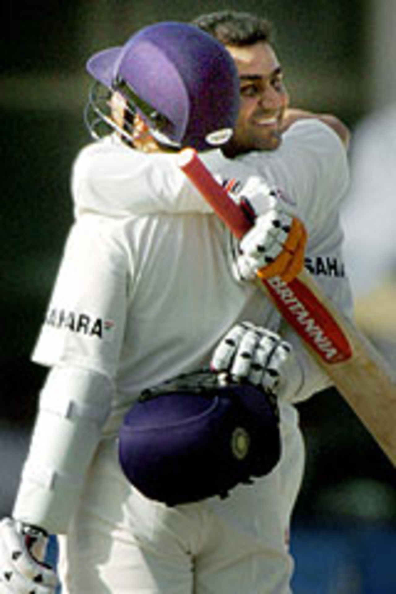 Virender Sehwag hugs Sachin Tendulkar on reaching 200, Pakistan v India, 1st Test, Multan, 1st day, March 28, 2004