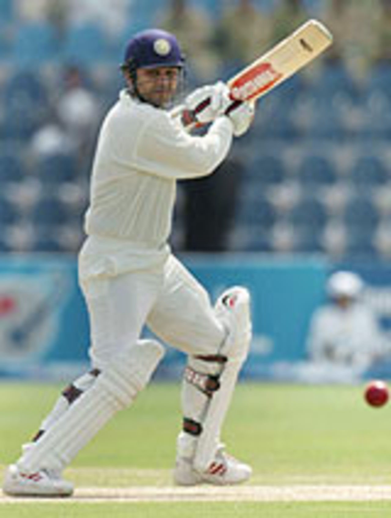 Virender Sehwag drives the ball square, Pakistan v India, 1st Test, Multan, 1st day, March 28, 2004