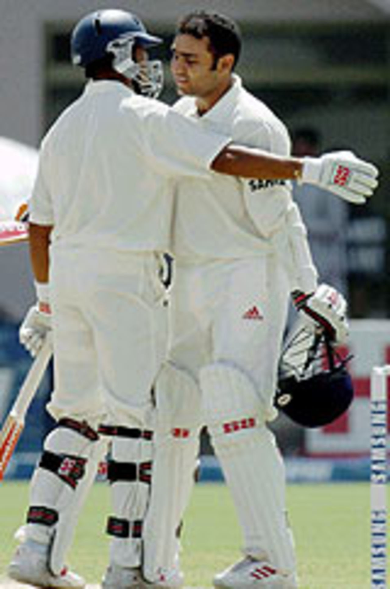 Virender Sehwag hugs Aakash Chopra after reaching his century, Pakistan v India, 1st Test, Multan, 1st day, March 28, 2004