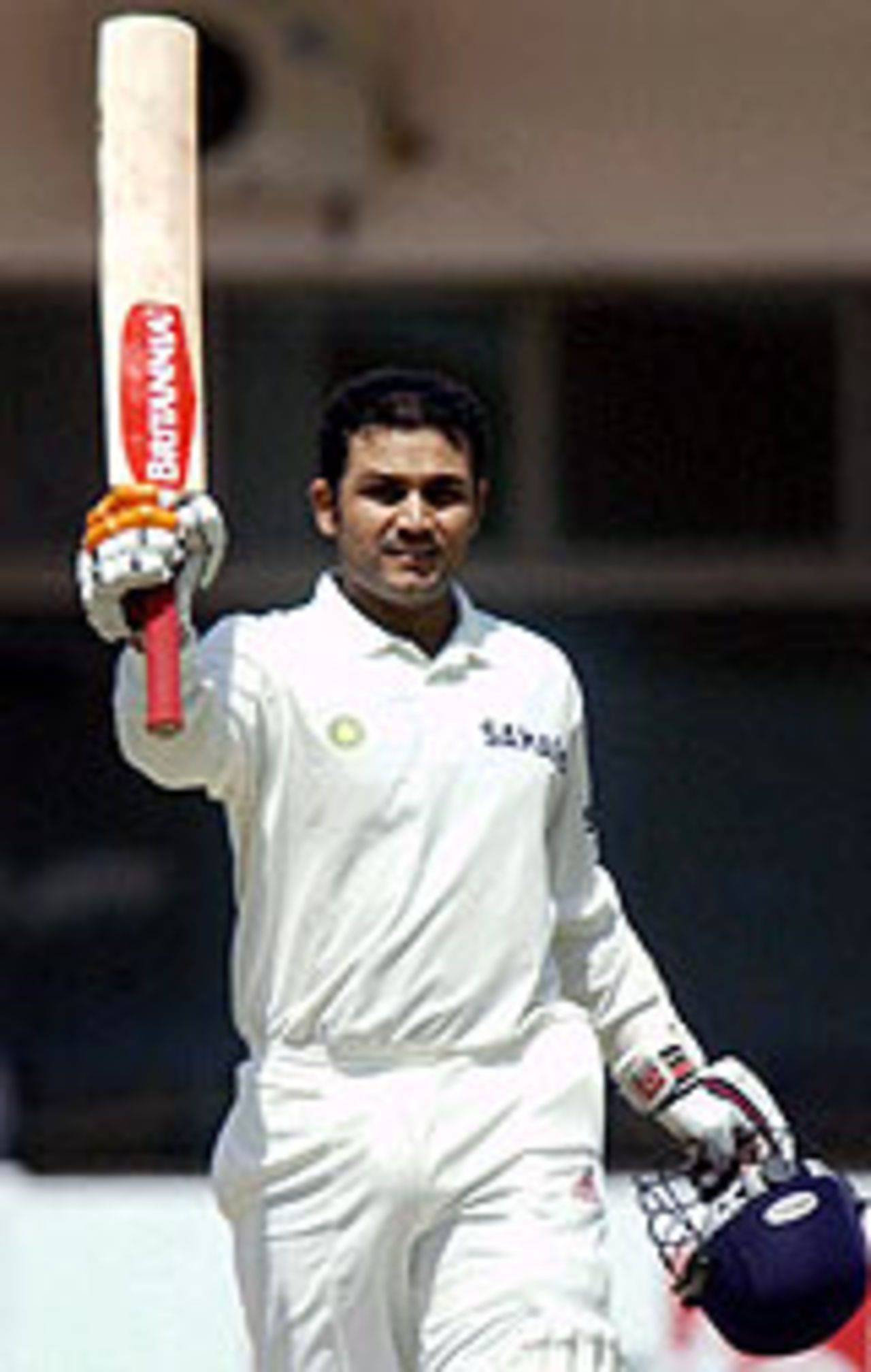 Virender Sehwag acknowledges the applause after reaching his triple-century with a six, Pakistan v India, 1st Test, Multan, 2nd day, March 29, 2004