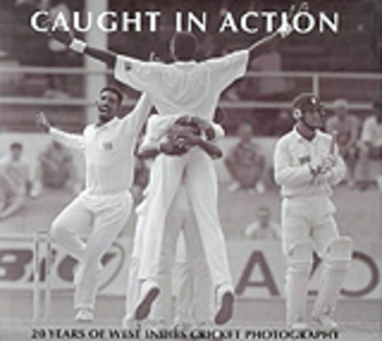 Caught in action - book cover