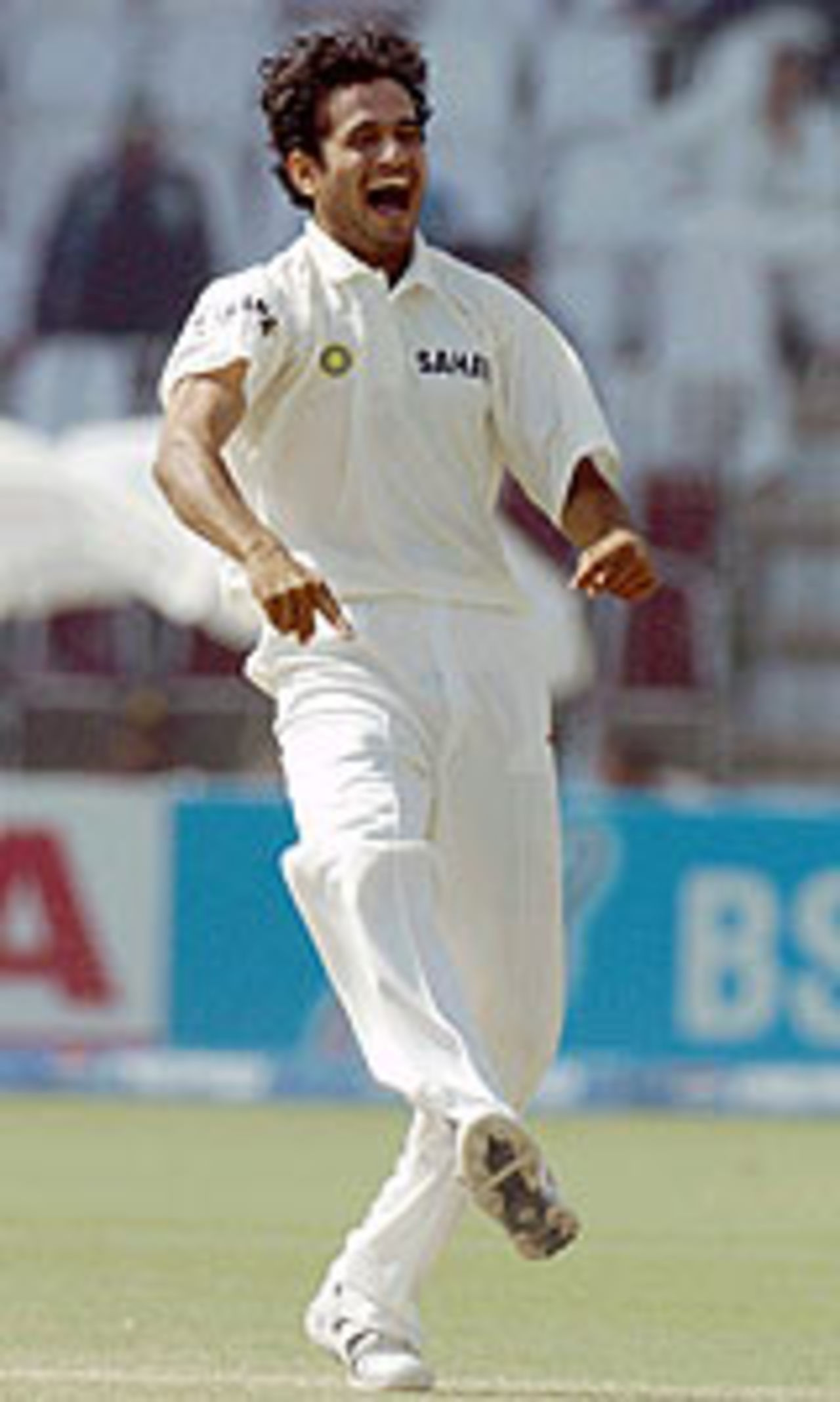 Irfan Pathan celebrates after picking up Abdul Razzaq's wicket with the first ball of the fourth day Pakistan v India, 1st Test, Multan, 4th day, March 31, 2004