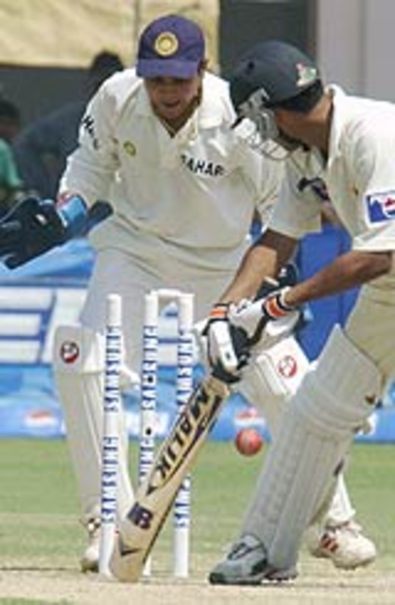 Mohammad Sami is bowled as Parthiv Patel watches, Pakistan v India, 1st Test, Multan, 4th day, March 31, 2004