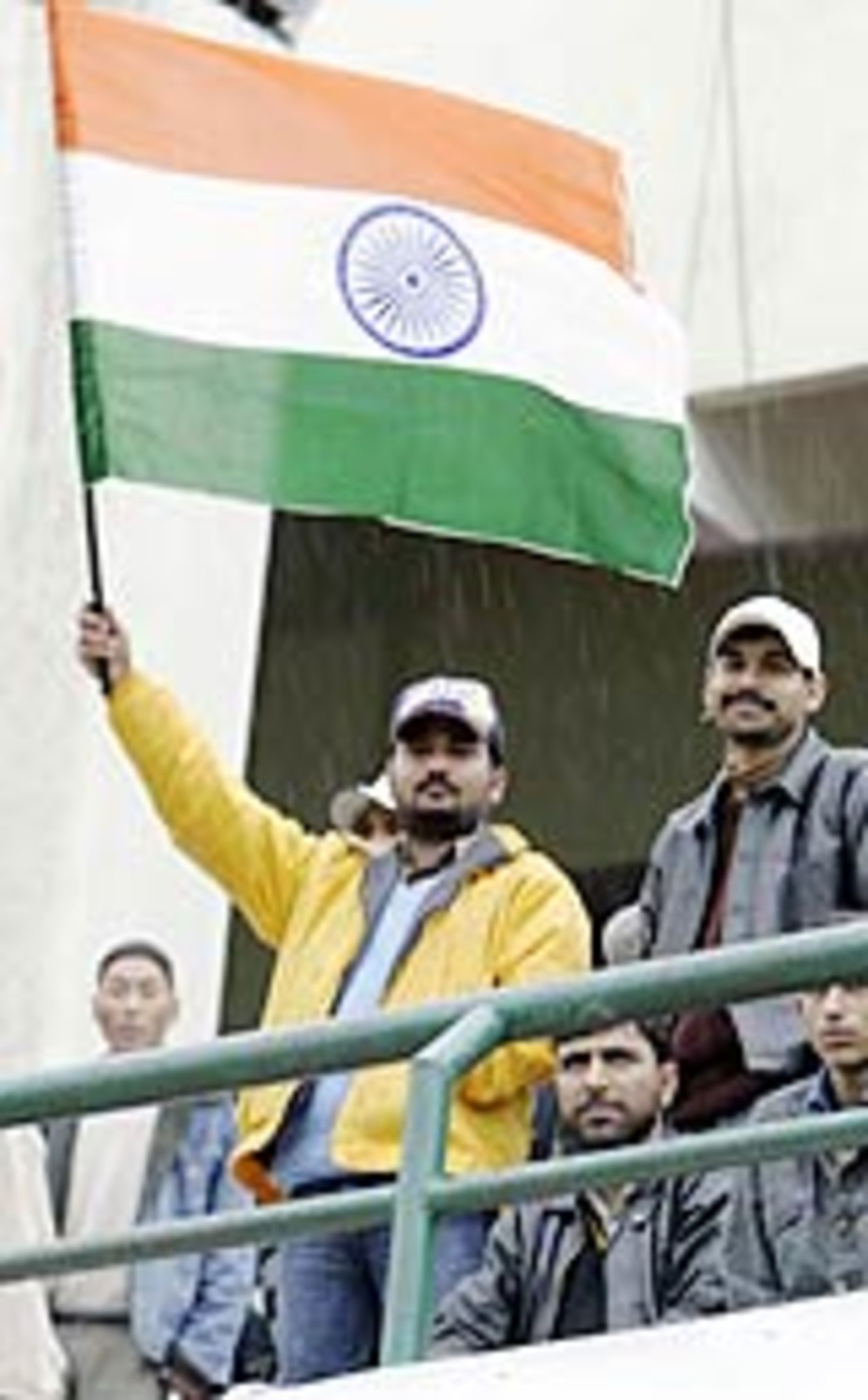 An Indian supporter waving the tricolour, Indian BP XI v Pakistanis, Dharamshala, March 3, 2005