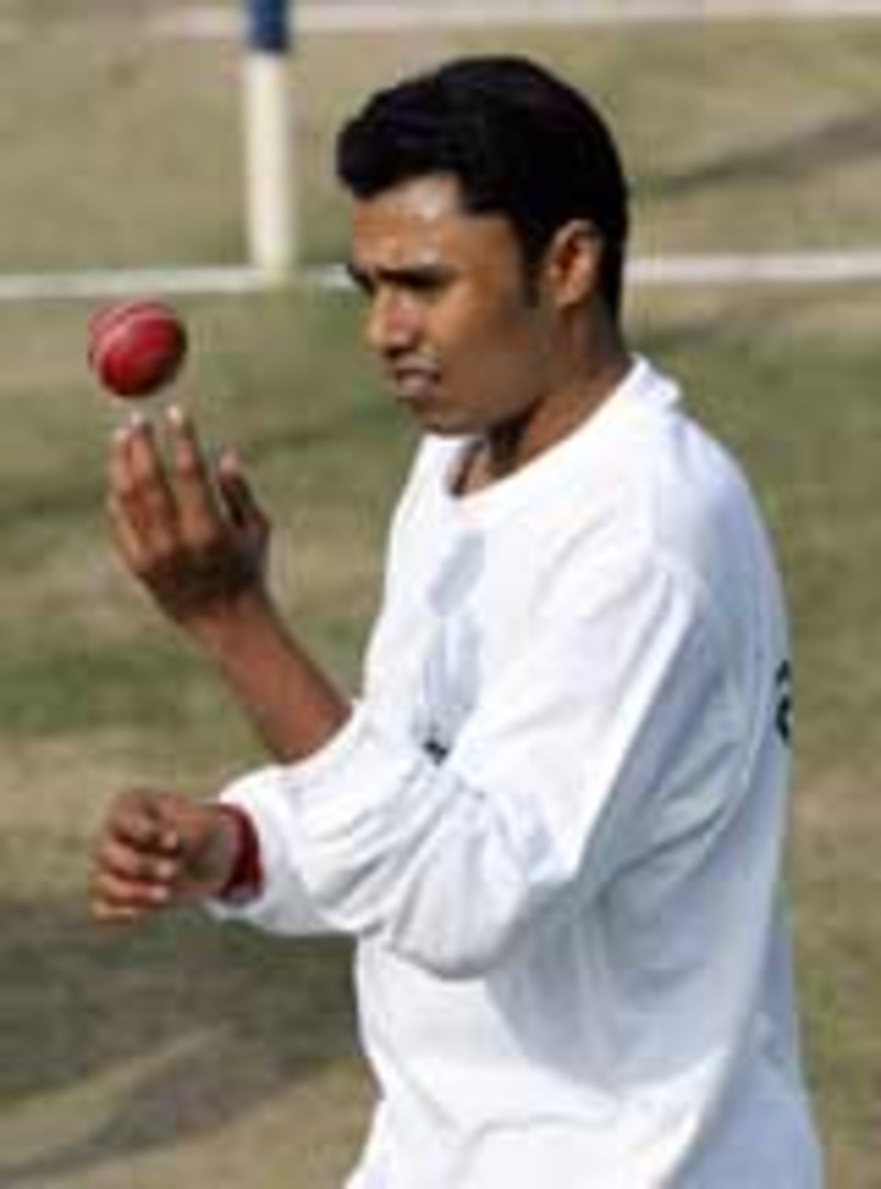 Danish Kaneria twirls the ball at practice ahead of the 1st Test against India, March 7, 2005