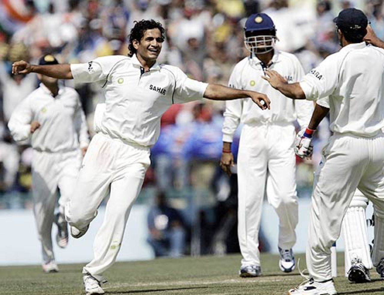 Irfan Pathan celebrates with his teammates after dismissing Yousuf Youhana in Mohali, India v Pakistan, March 8, 2005