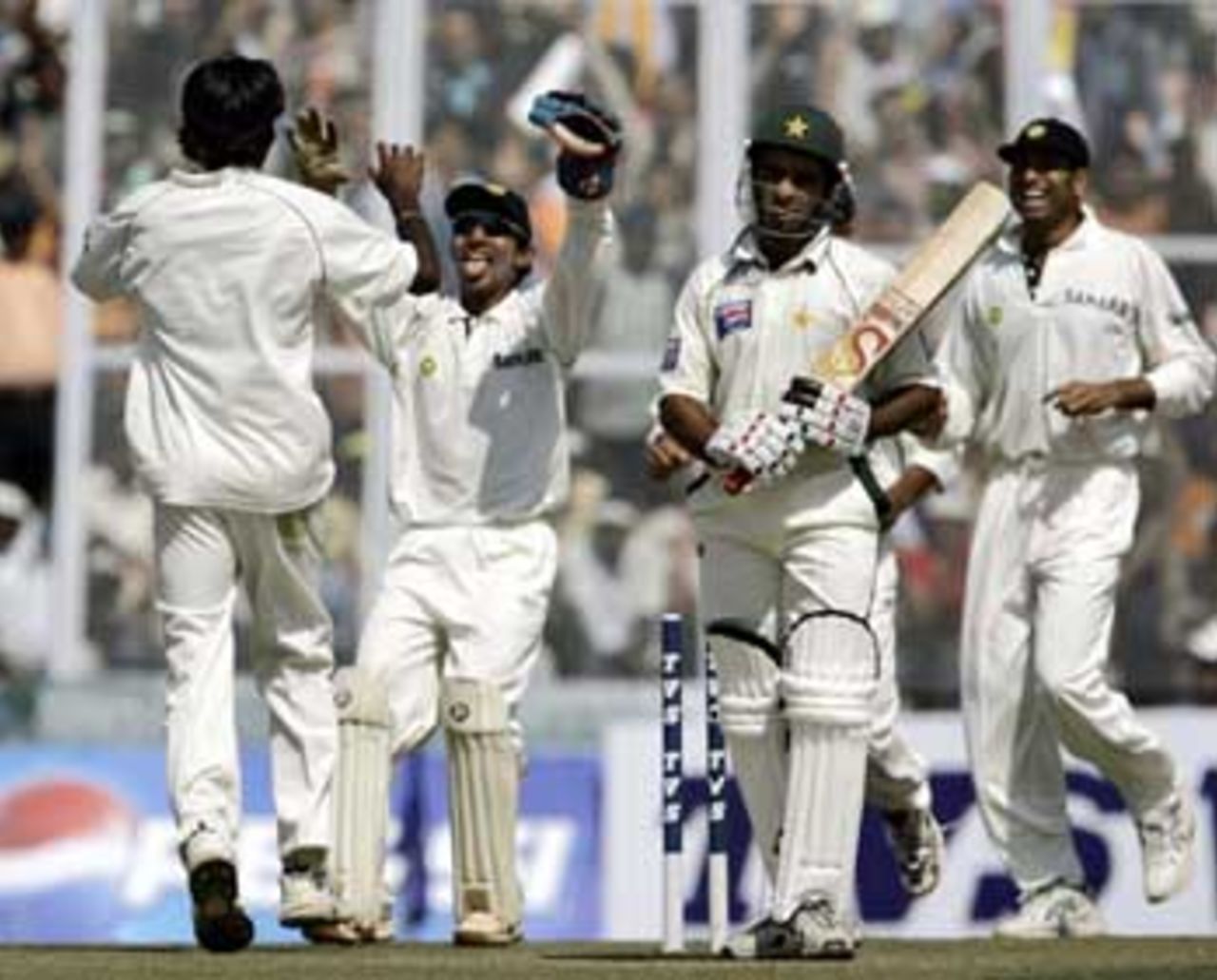 The Indians have plenty to celebrate when they go in for lunch, India v Pakistan, 1st Test, Mohali, March 8, 2005
