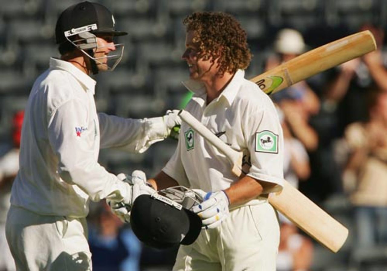 Nathan Astle congratulates Hamish Marshall for his century, New Zealand v Australia, 1st Test, Christchurch, March 10, 2005