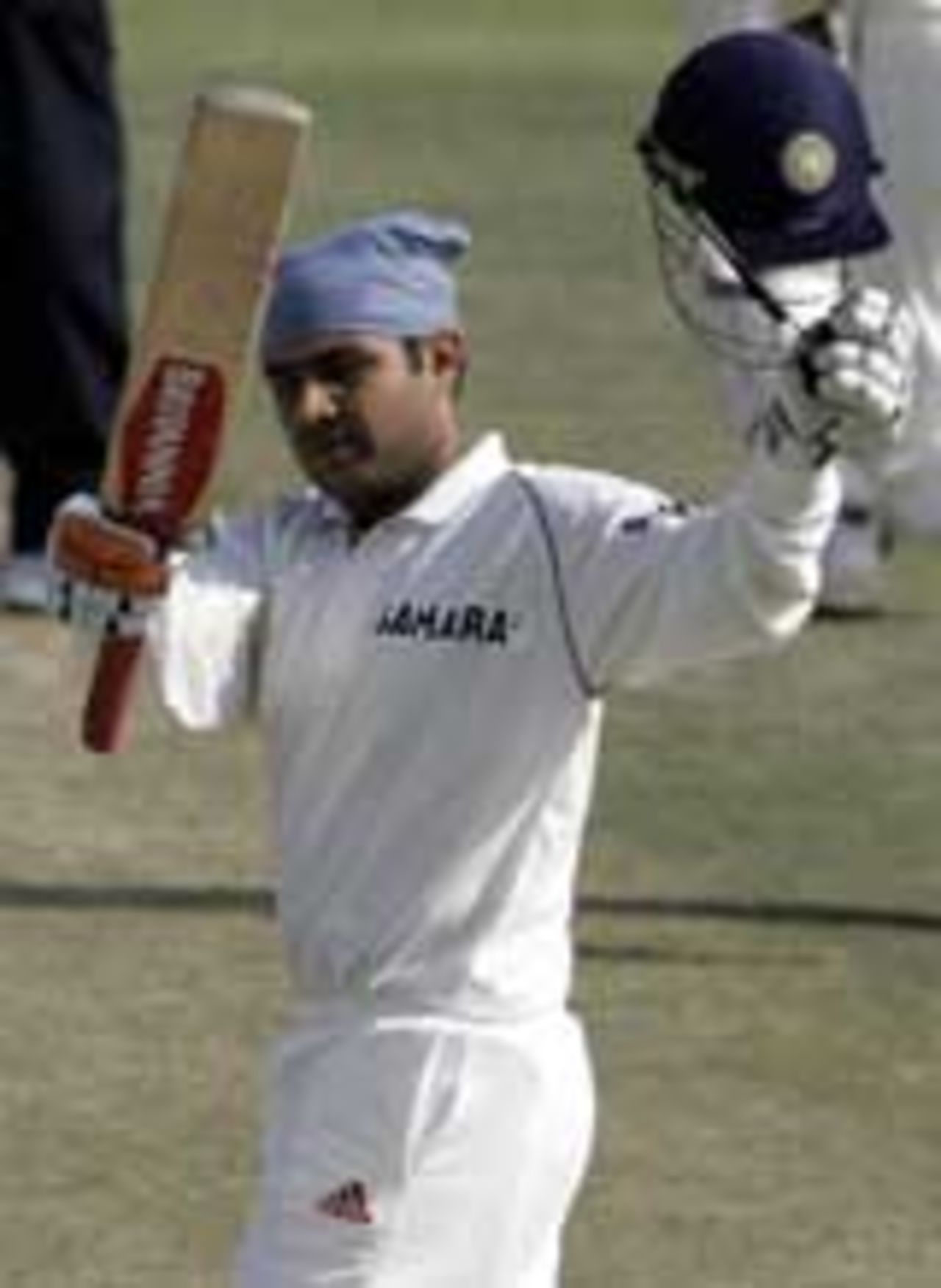 Virender Sehwag waves his bat to the crowd, India v Pakistan, 1st Test, Mohali, March 10, 2005