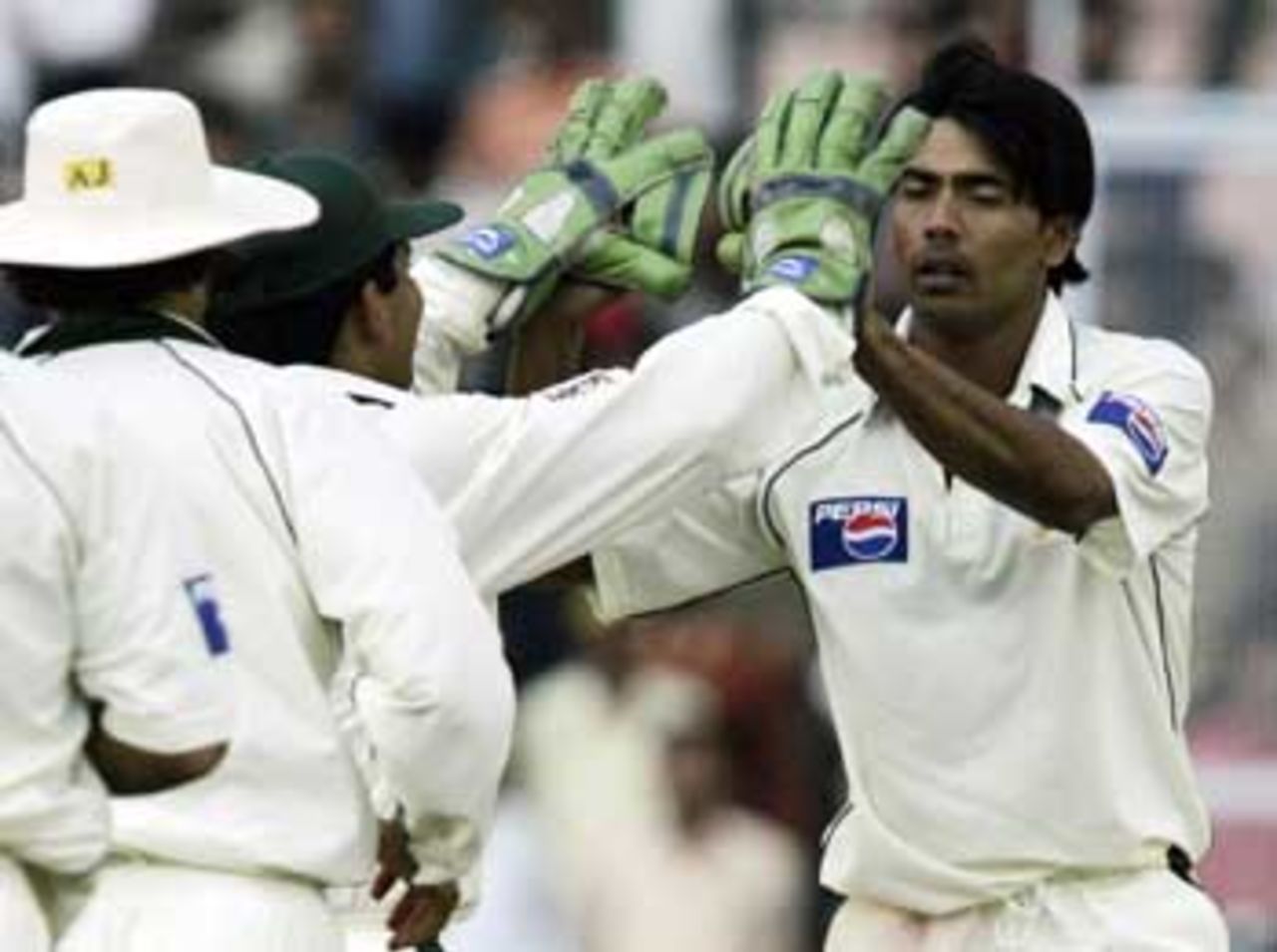 Even Mohammad Sami got in on the act, picking up the wickets of Rahul Dravid and Dinesh Karthik, India v Pakistan, 1st Test, Mohali, March 10, 2005