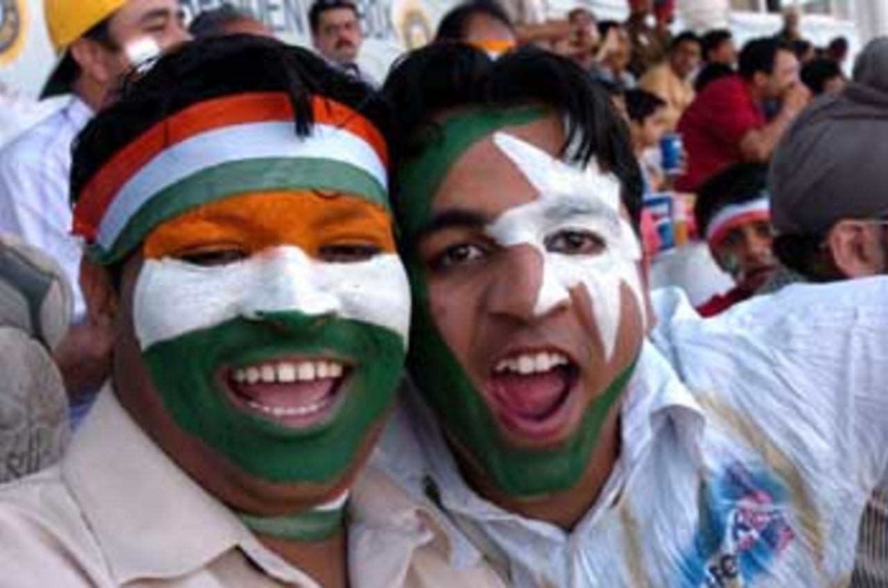 The fans got in the act, painting flags of both sides on their cheeks, India v Pakistan, 1st Test, Mohali, March 11, 2005