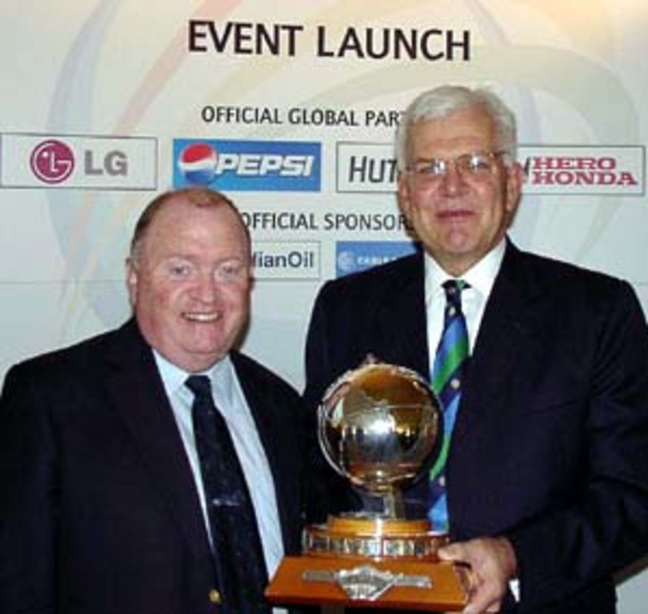 Pictured with the 2005 ICC Trophy are ICU Chairman Joe Doherty and Chief Executive of the ICC, Malcolm Speed.
