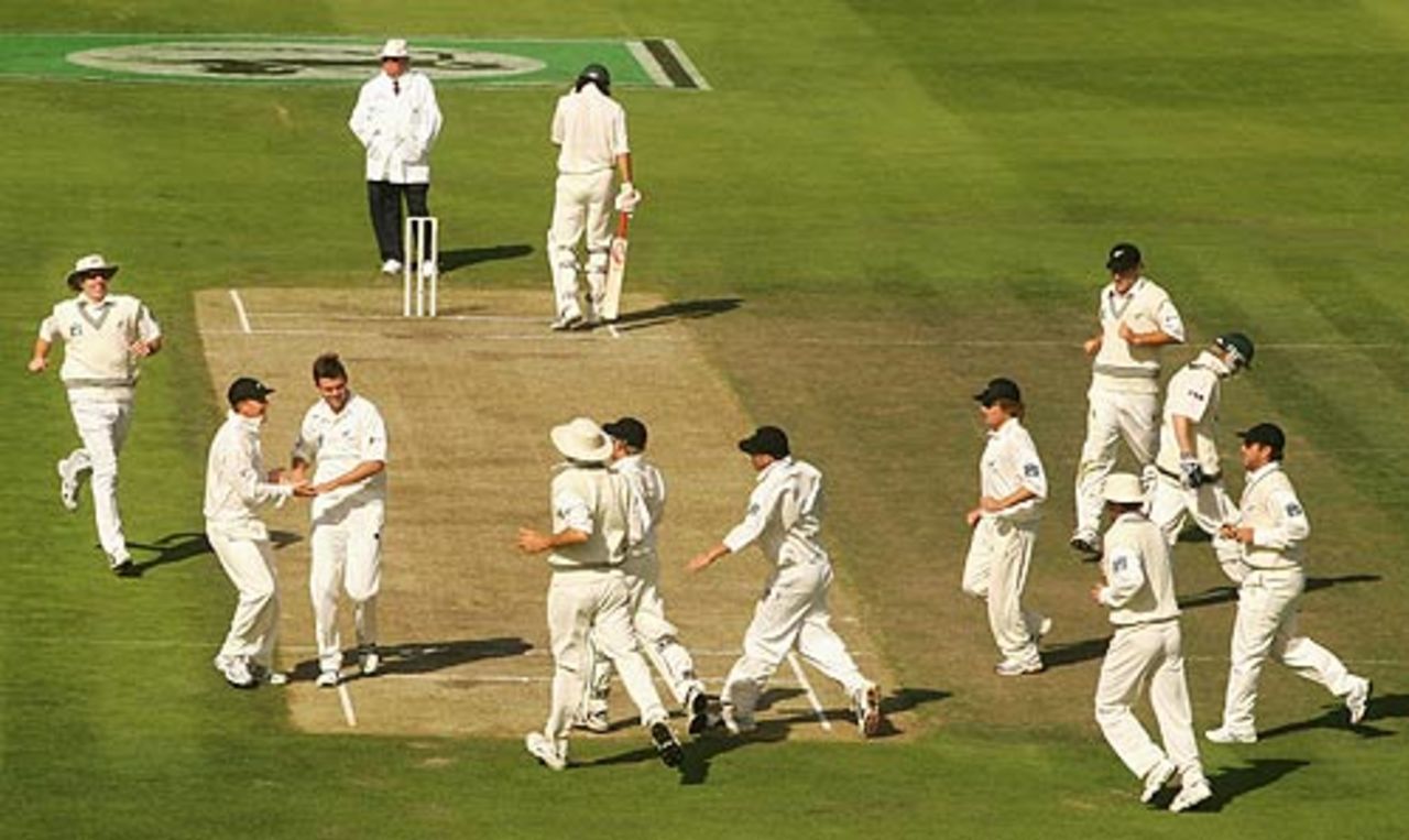 Fielders rush to James Franklin after his dismissal of Michael Clarke, New Zealand v Australia, 1st Test, Christchurch, March 12, 2005