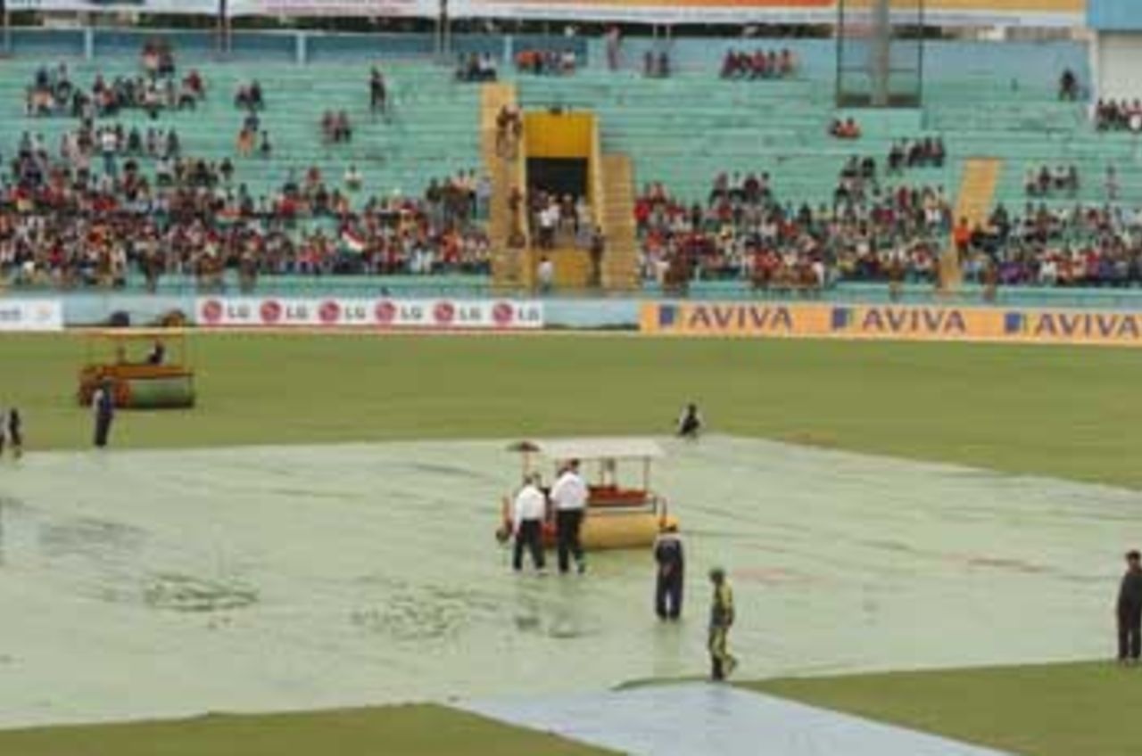 The Heavens open up!! The commencement of the Indian innings was delayed on day two because of surprise showers. Play was held up for more than three hours and play finally began at 1420 hours, India v Pakistan 1st Test at Mohali, 8-12 March 2005