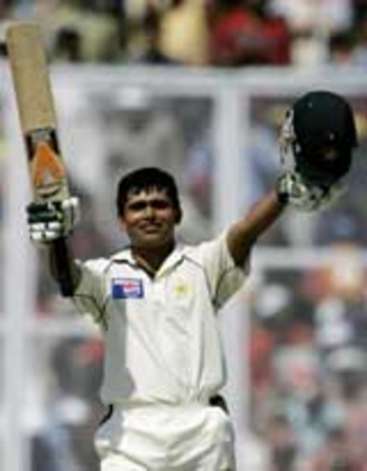 Kamran Akmal celebrates his century, India v Pakistan, 1st Test, Mohali, 5th day, March 12, 2005