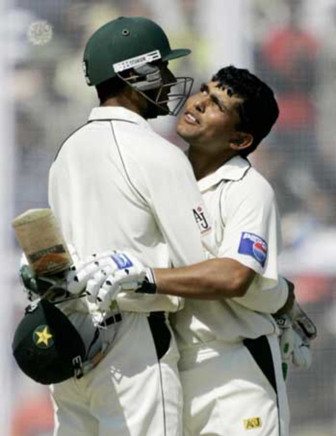 Abdul Razzaq embraced Kamran Akmal, the man responsible for Pakistan's revival, India v Pakistan, 1st Test, Mohali, 5th day, March 12, 2005