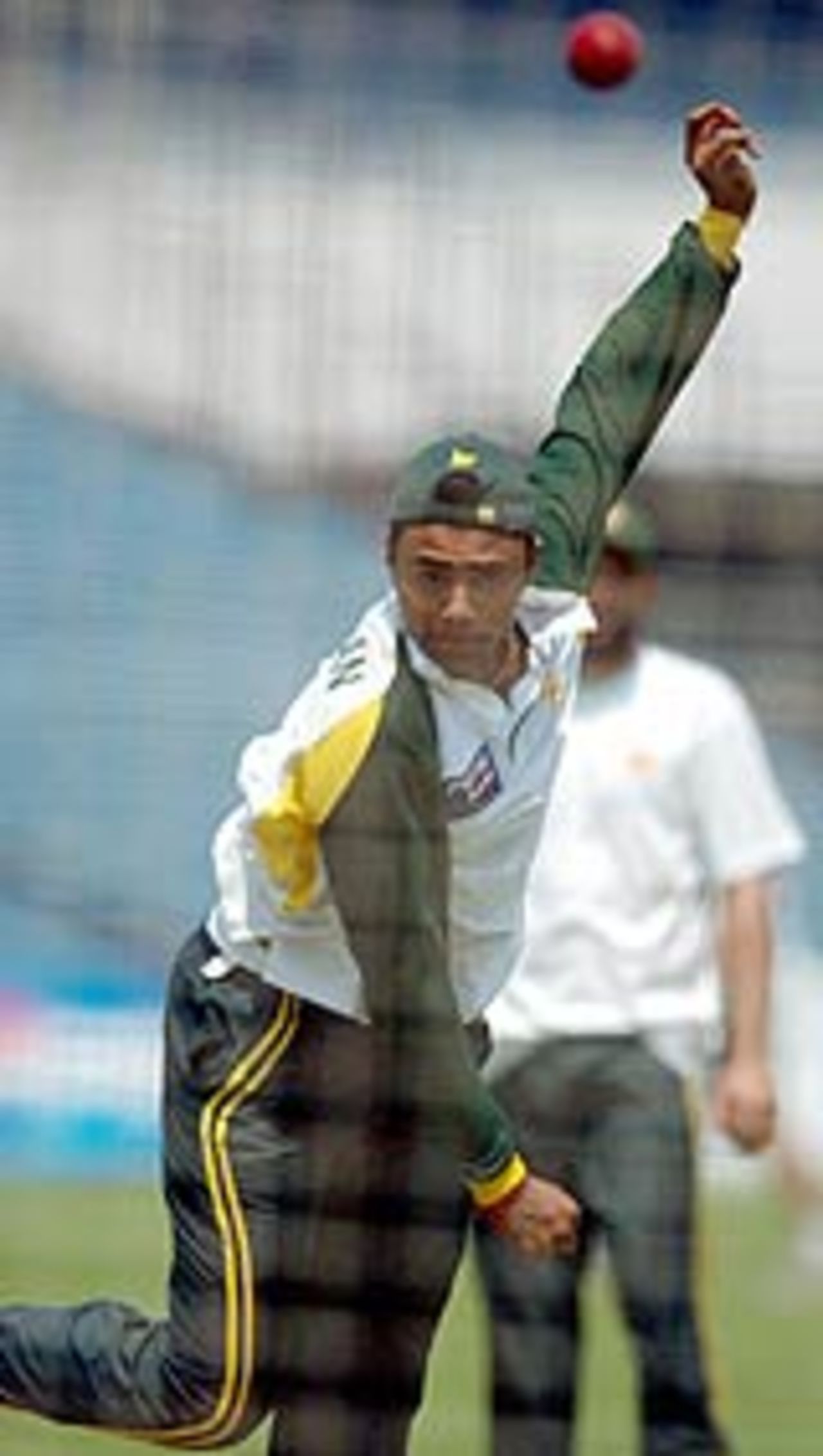 Danish Kaneria bowls in the nets, Kolkata, March 15, 2005