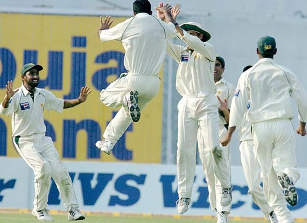 Abdul Razzaq doubled his joy by trapping VVS Laxman leg before with a ball that jagged back, India v Pakistan, 2nd Test, Kolkata, March 16, 2005