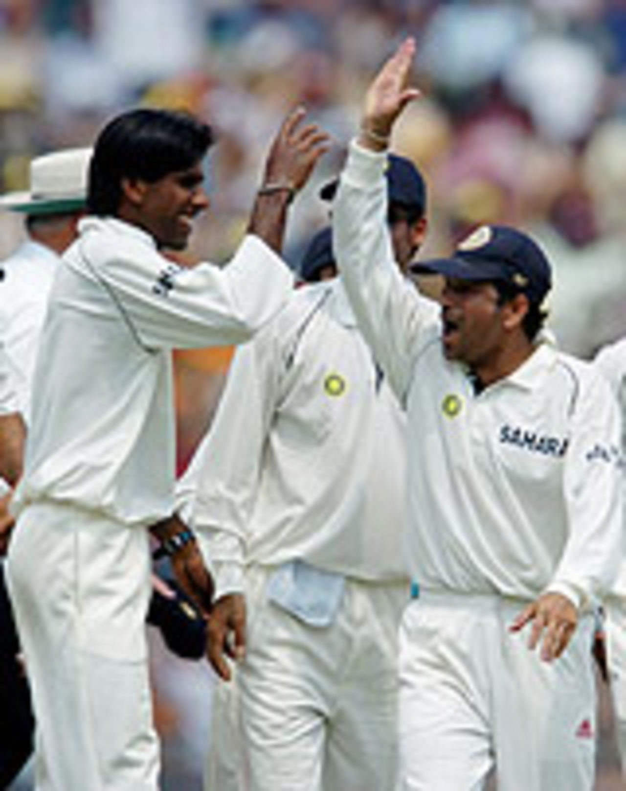 Lakshmipathy Balaji and Sachin Tendulkar celebrate Asim Kamal's run-out, India v Pakistan, 2nd Test, Kolkata, March 18, 2005