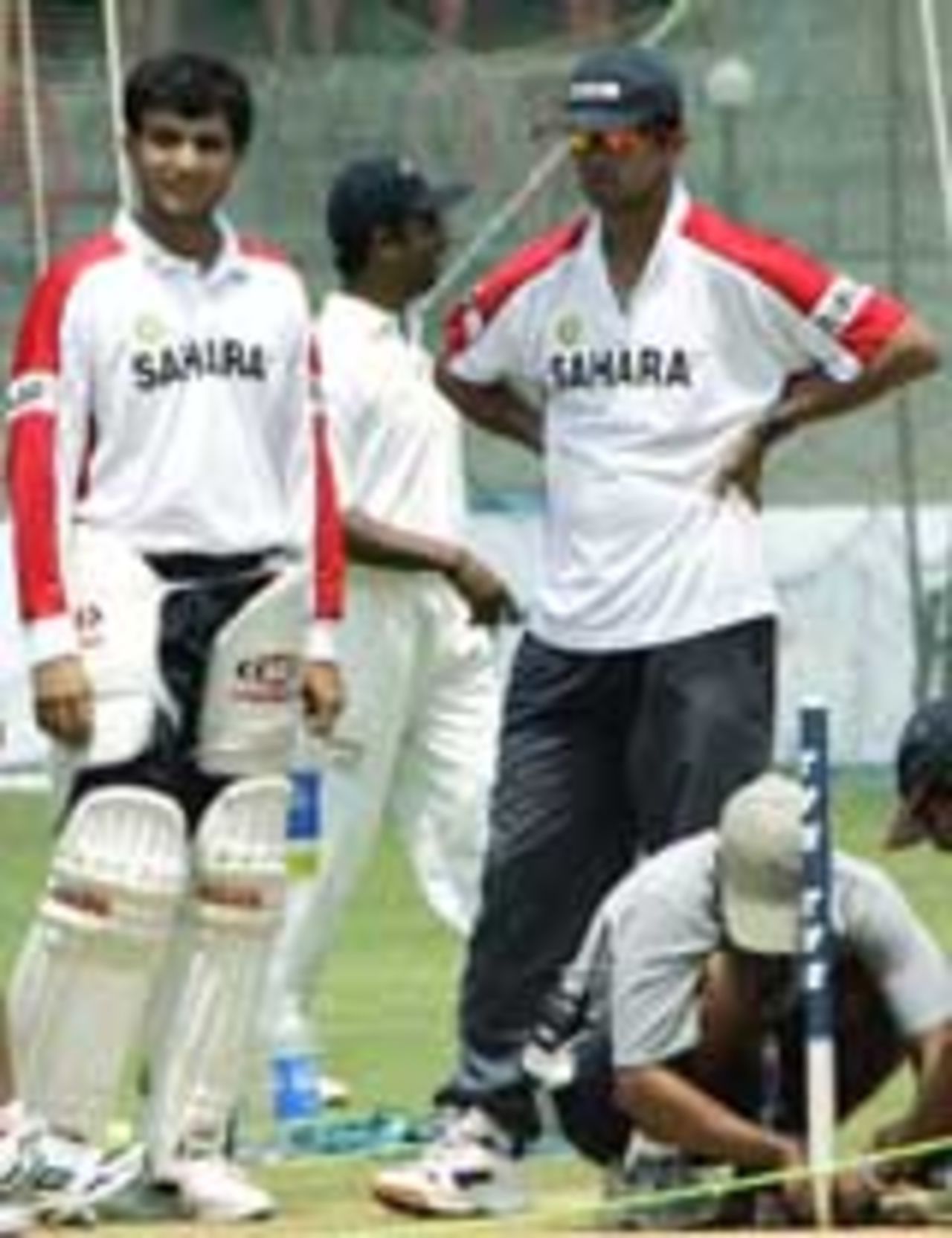 Sourav Ganguly and Rahul Dravid watch pitch preparations ahead of the 3rd Test against Pakistan, Bangalore, March 23, 2005