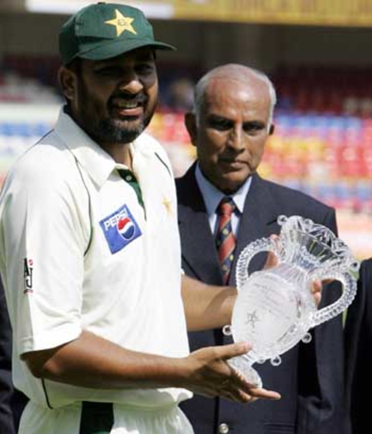 The day began with Inzamam-ul-Haq receiving a cup commemorating his playing 100 Tests, India v Pakistan, 3rd Test, Bangalore, 1st day, March 24, 2005