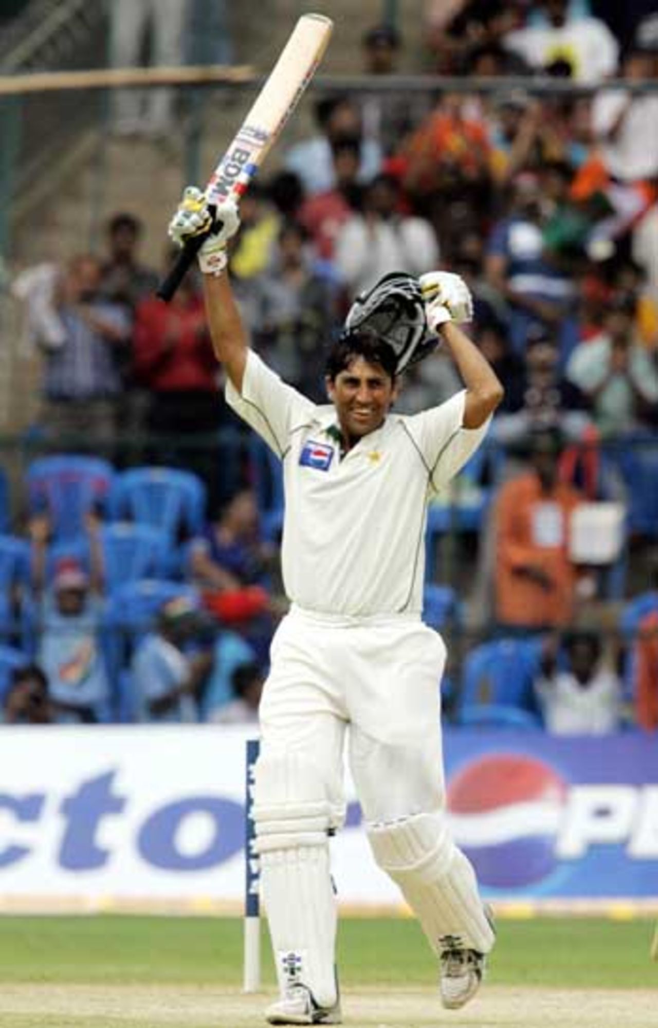 Younis Khan celebrates after becoming the first Pakistani to score a double-century in India, India v Pakistan, 3rd Test, Bangalore, 1st day, March 24, 2005
