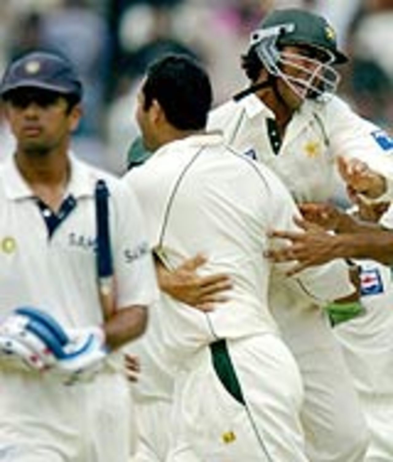 Arshad Khan celebrates the vital wicket of Rahul Dravid, India v Pakistan, 3rd Test, Bangalore, 5th day, March 28, 2005