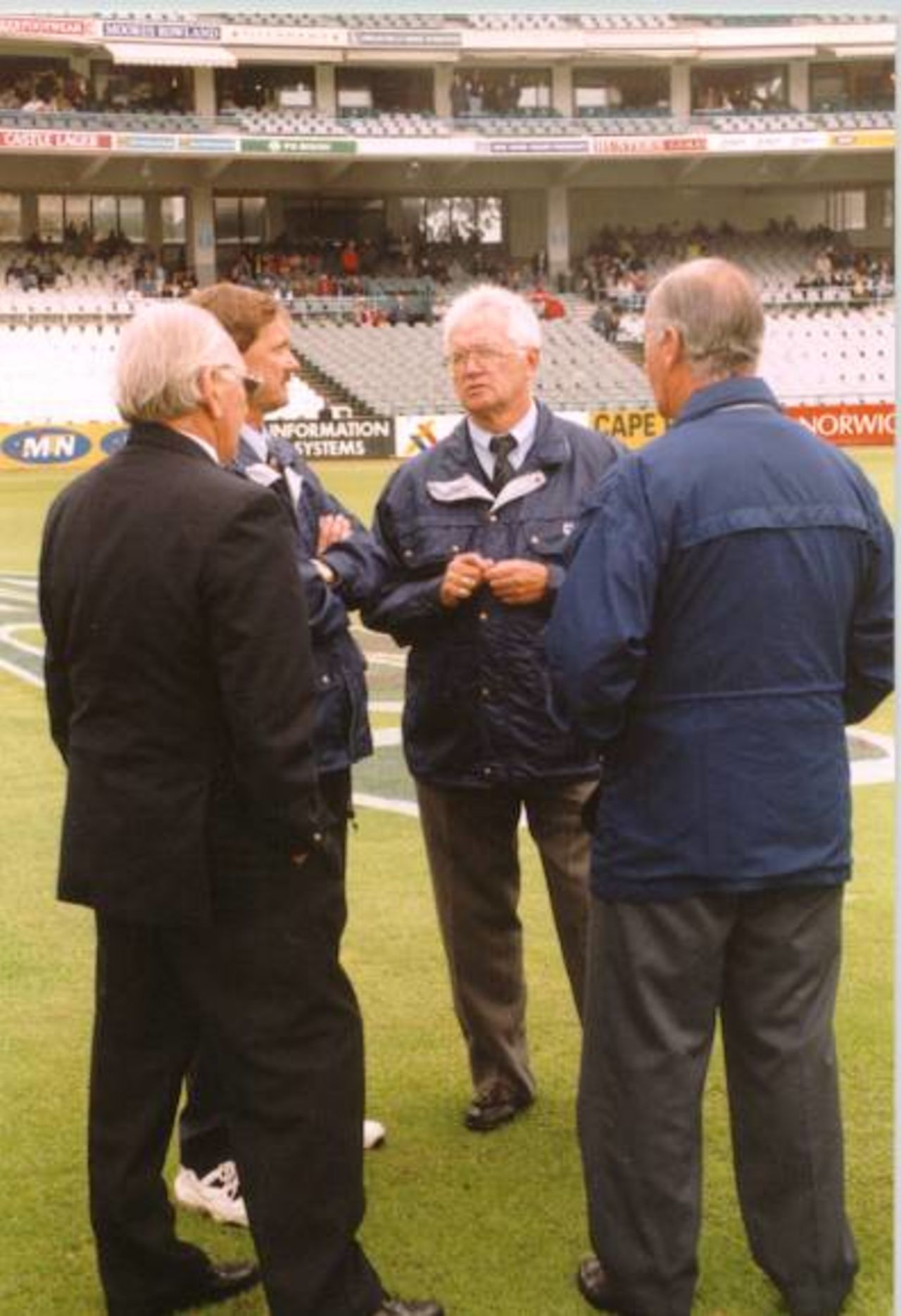 (from left) - Match referee John Reid (New Zealand), 3rd Umpire Rob Brookes with match umpires Cyril Mitchelly and Rudy Kroetzen. Standard Bank tournament final, abandoned game on 22 April 1998 at Newlands, Cape Town SA.