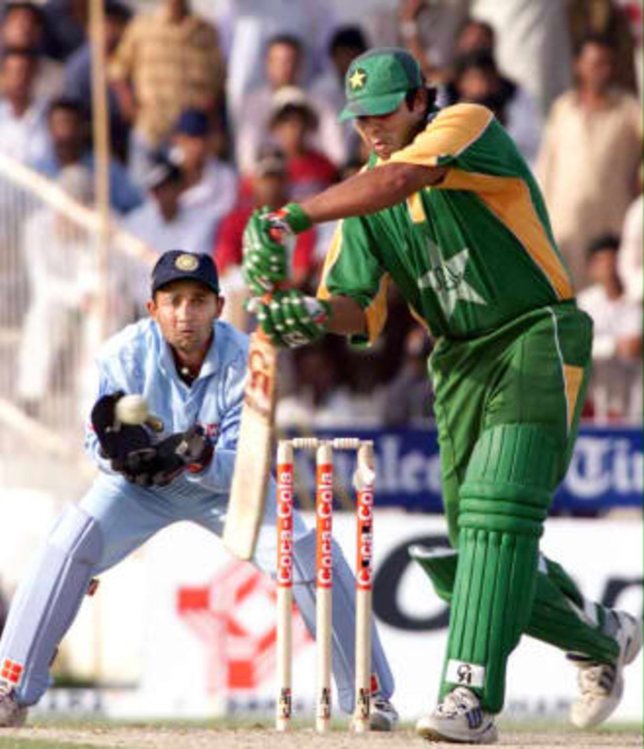 Inzamam-Ul-Haq bats while Naayan Mongia keeps a keen eye on the ball on 8th April 1999 in the Coca Cola Cup at Sharjah
