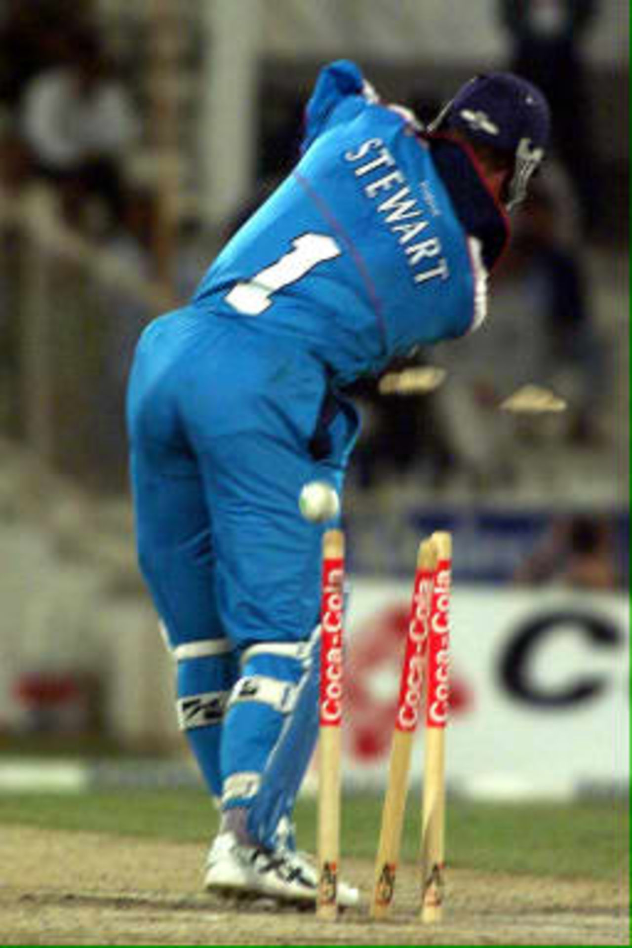 England captain Alec Stewart's middle stump is knocked out by Javagal Srinath after having scored 10 runs in the third match of the Coca Cola Cup held on 9th April 1999 in Sharjah