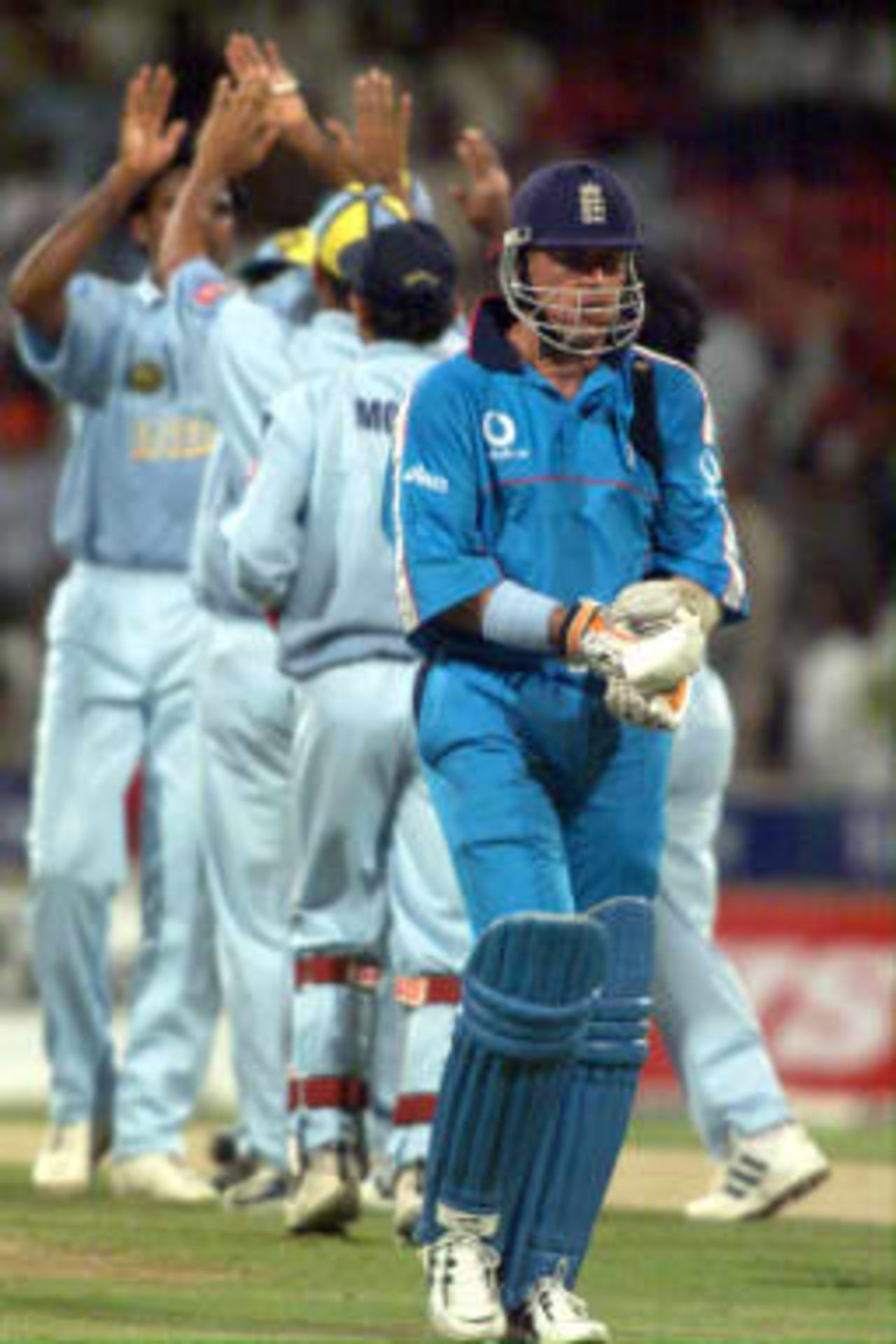 Neil Fairbrother walks back to the pavillion after losing his wicket to Ajay Jadeja in the 3rd match of the Coca Cola Championships payed in Sharjah on 9th April 1999