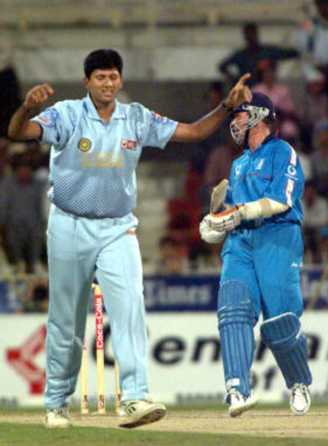 Indian bowler Venkatesh Prasad takes the wicket of England's Mark Ealham for only 7 runs in the 3rd match of the Coca Cola Championships on 9th April 1999 being played in Sharjah, U.A.E.