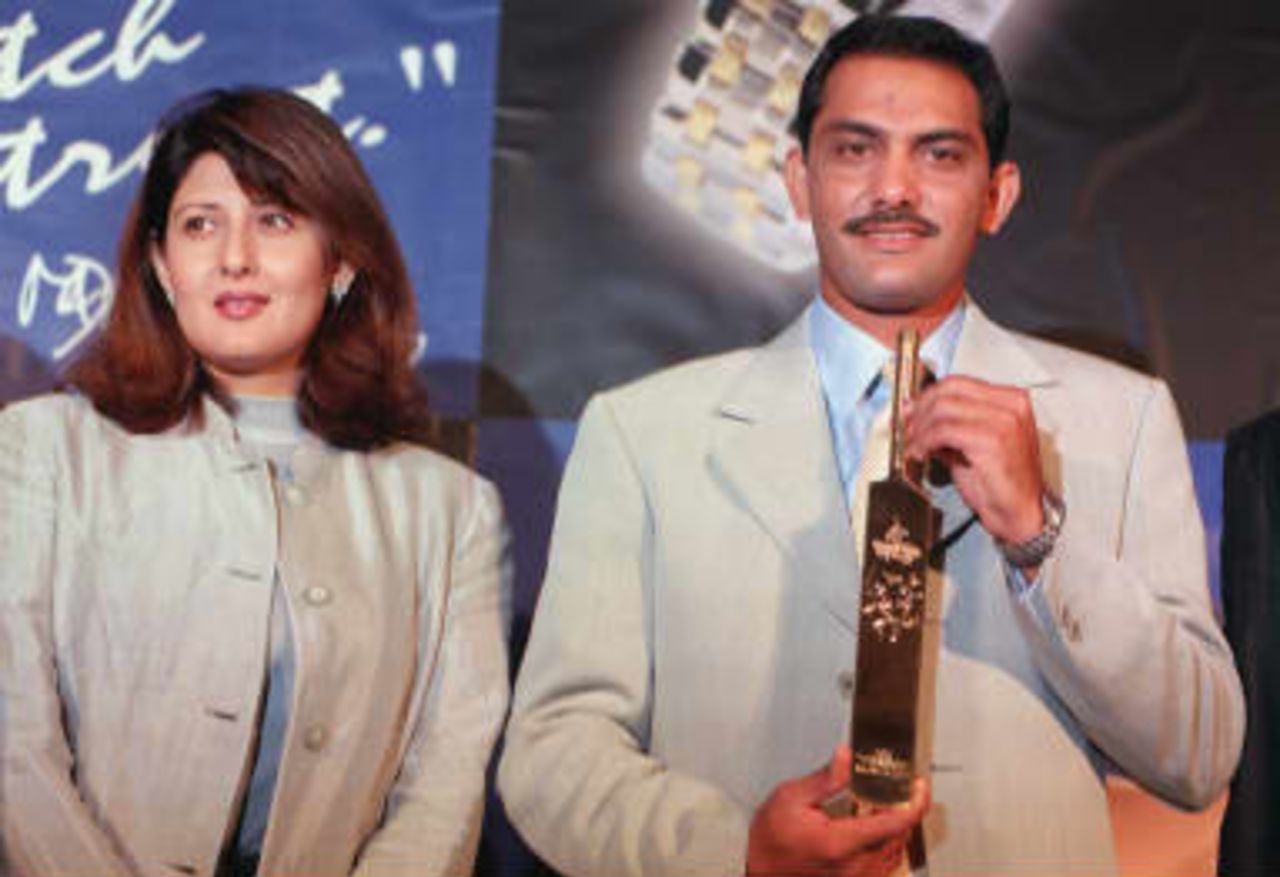 Indian skipper Mohammed Azaruddin with wife Sangeeta,was presented a momento on 21 April 1999 wishing him and the Indian Cricket team good luck for the  World Cup in England. The momento was presented by a Swiss watch manufacturing company, Tissot at a hotel in south Bombay.